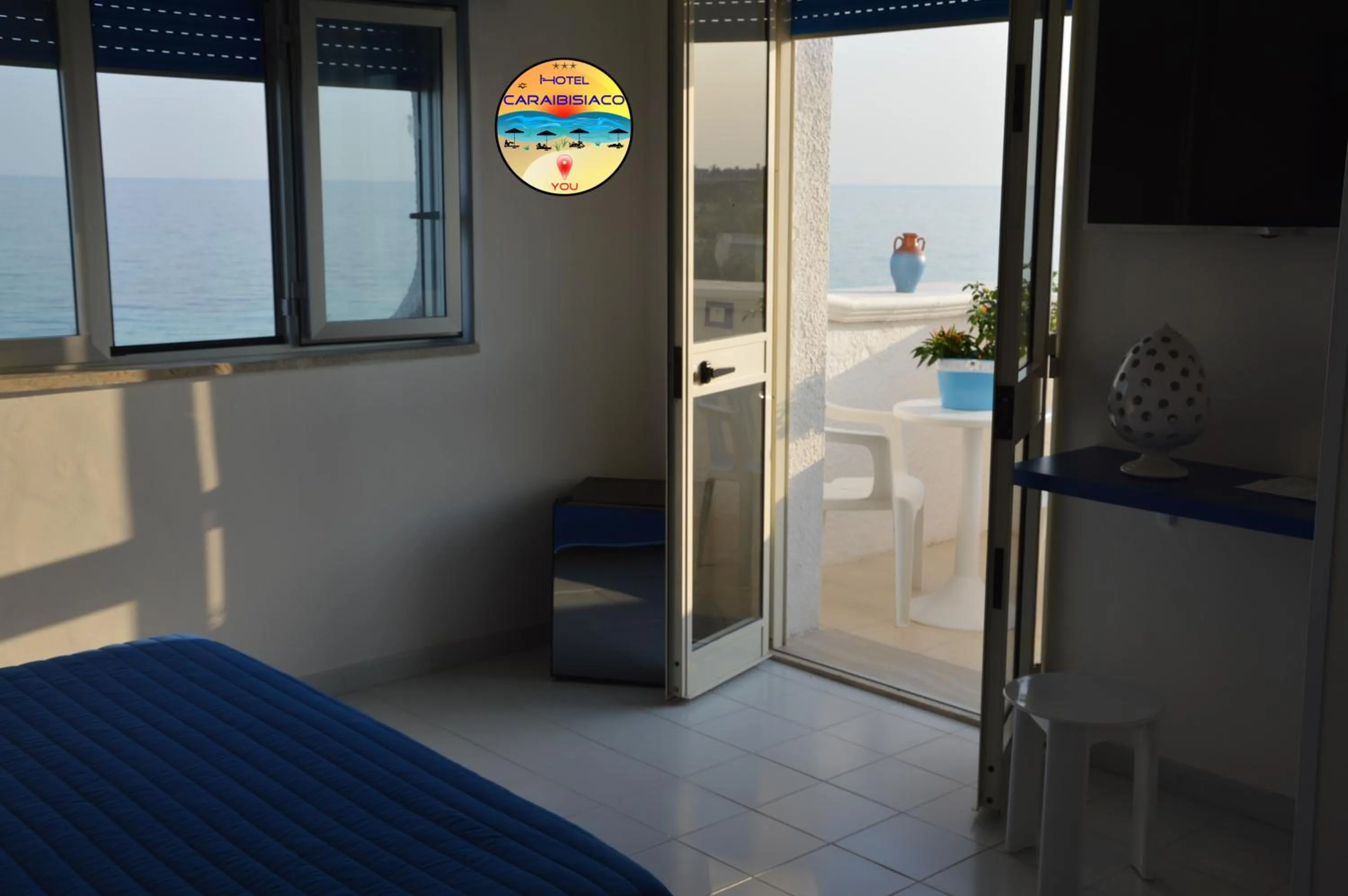 Balcony/Terrace, Bed in Hotel Caraibisiaco sul mare