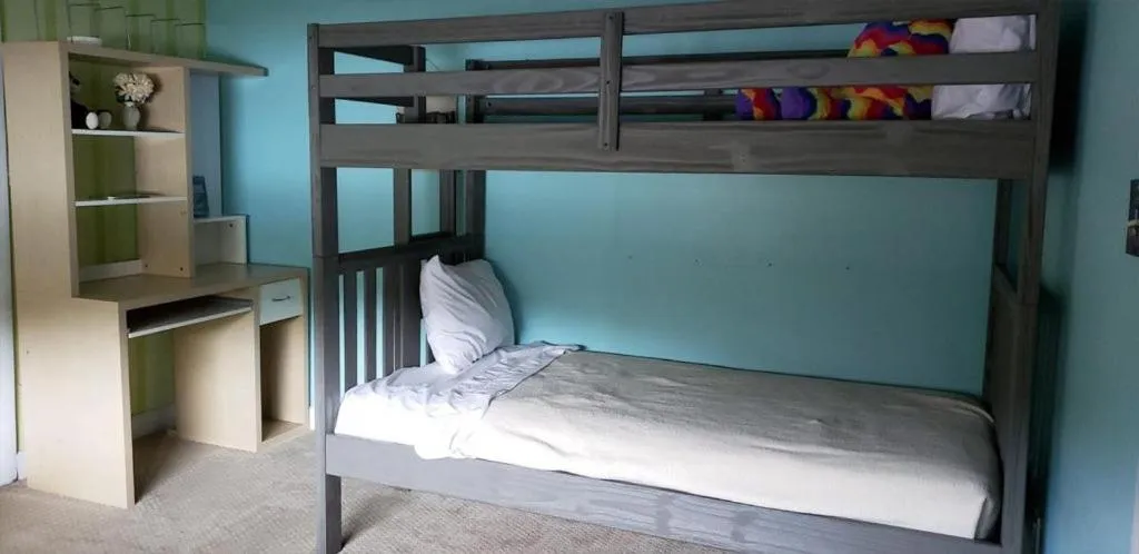 Bed in Gorham Motor Inn