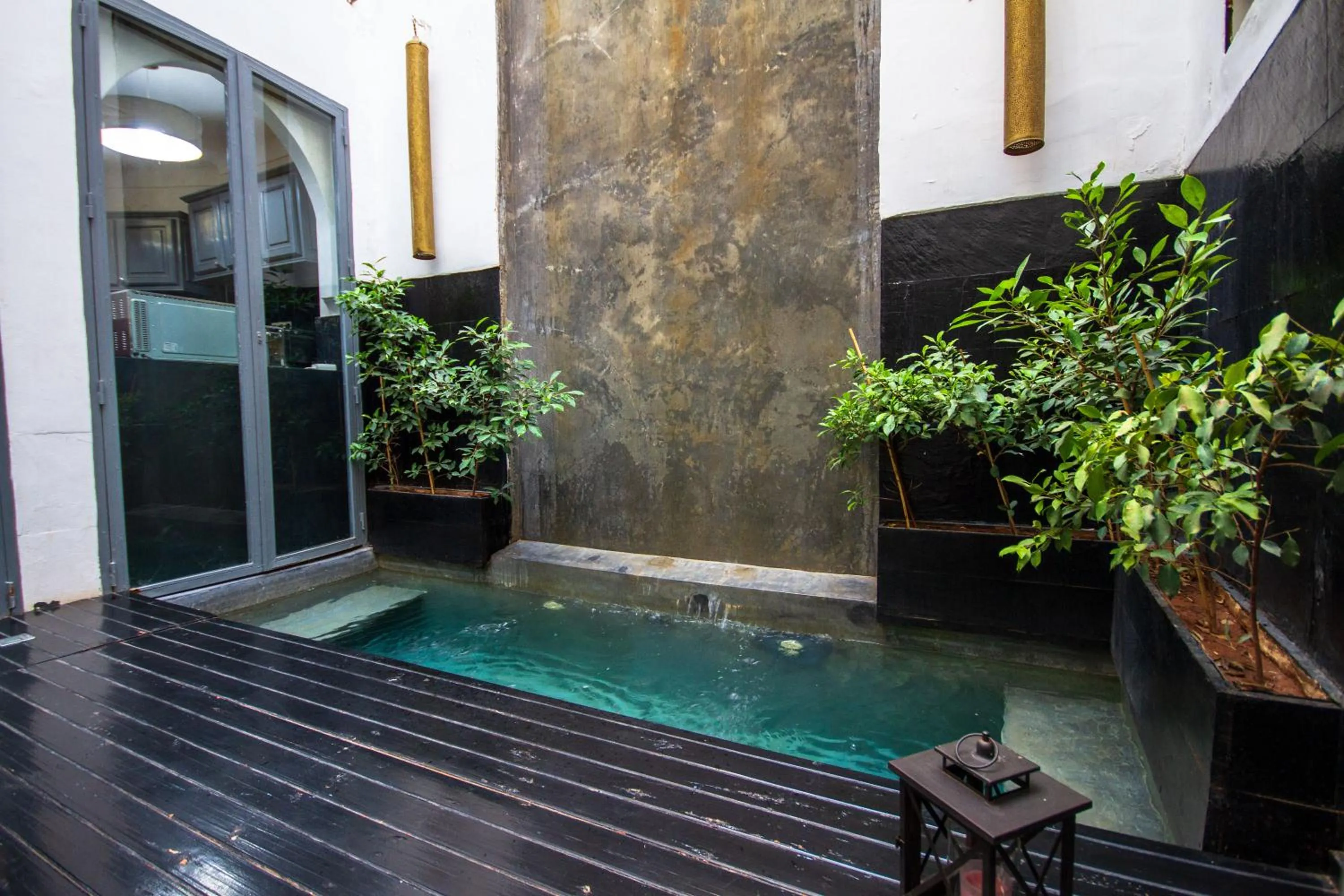 Swimming pool in Riad Les Jardins des Lilas