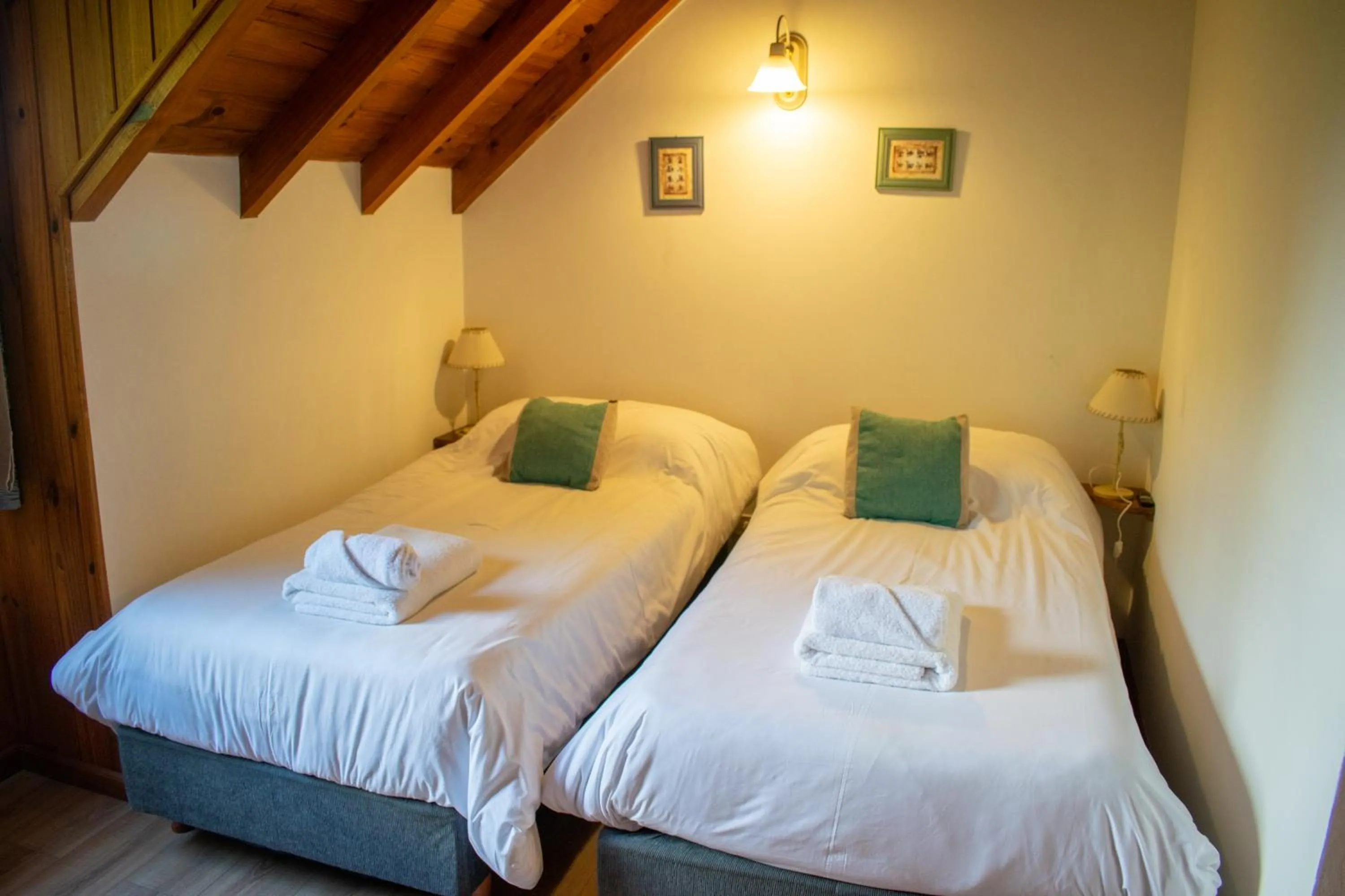 Bed in Hosteria y Cabañas Posada Quinen