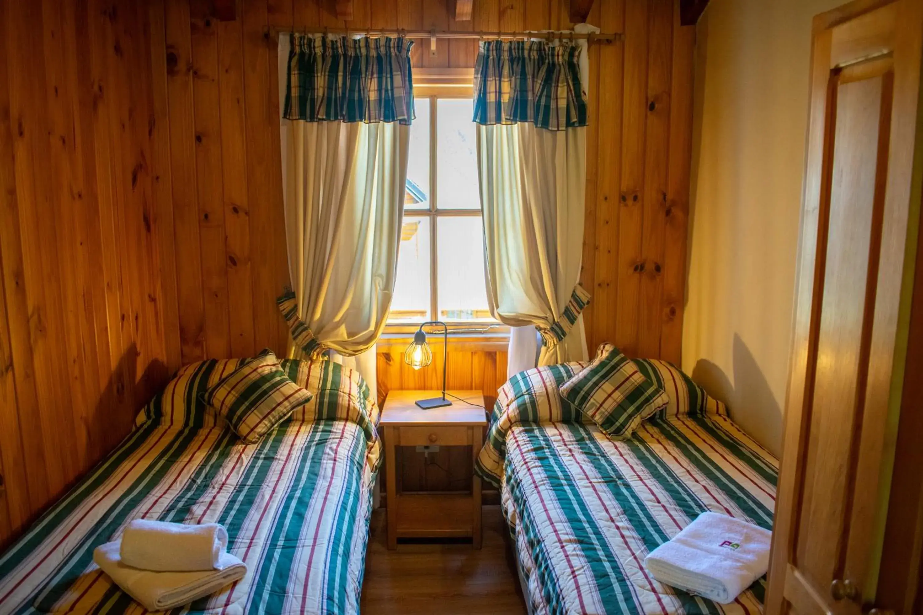 Bed in Hosteria y Cabañas Posada Quinen Bed in Hosteria y Cabañas Posada Quinen