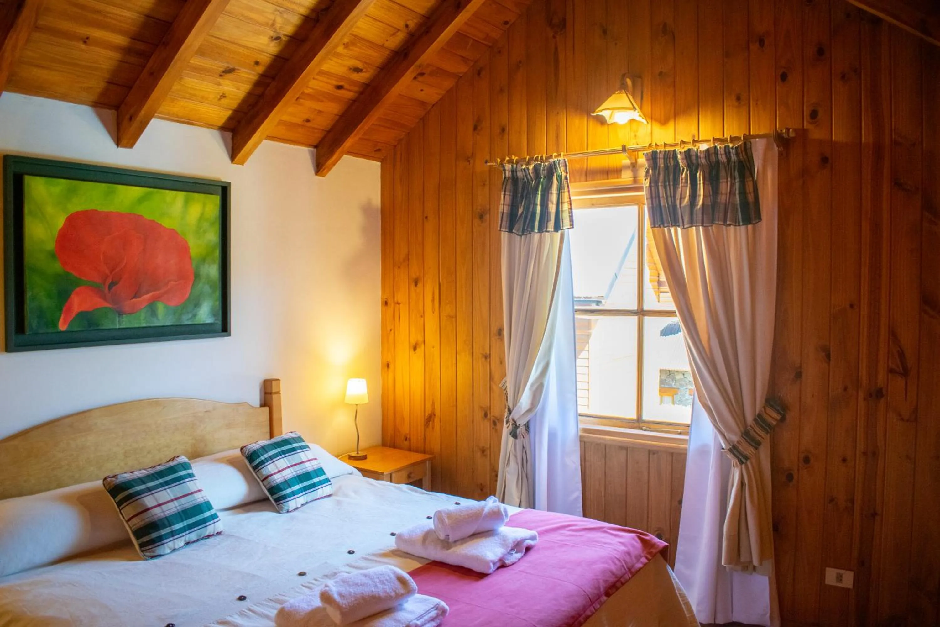 Bed in Hosteria y Cabañas Posada Quinen