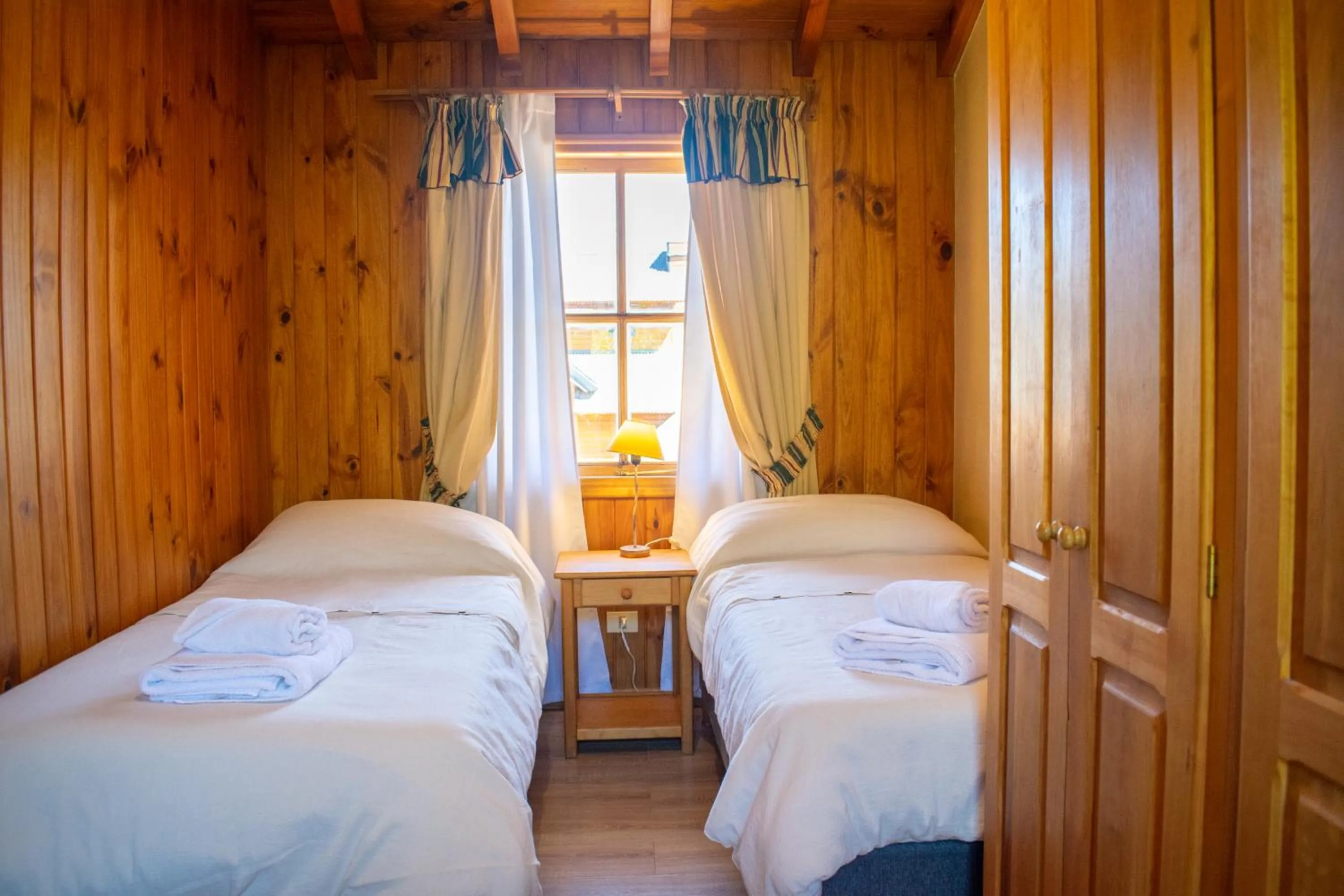 Bed in Hosteria y Cabañas Posada Quinen