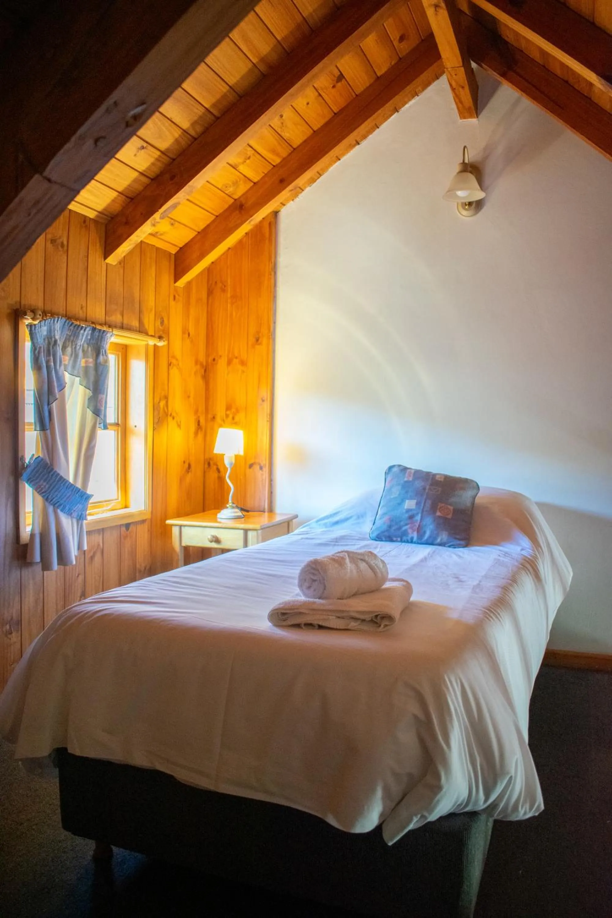 Bed in Hosteria y Cabañas Posada Quinen