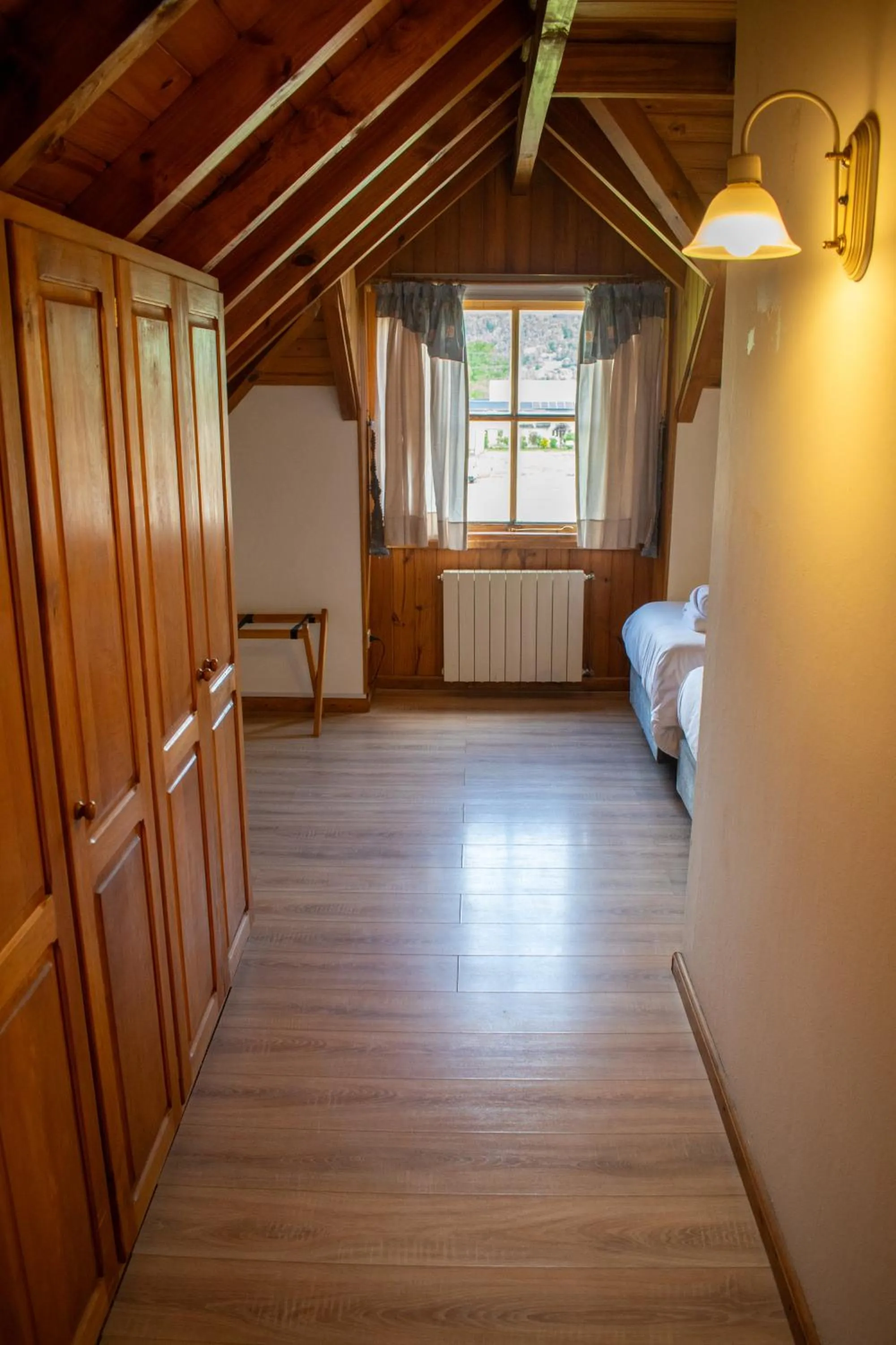 Bed in Hosteria y Cabañas Posada Quinen