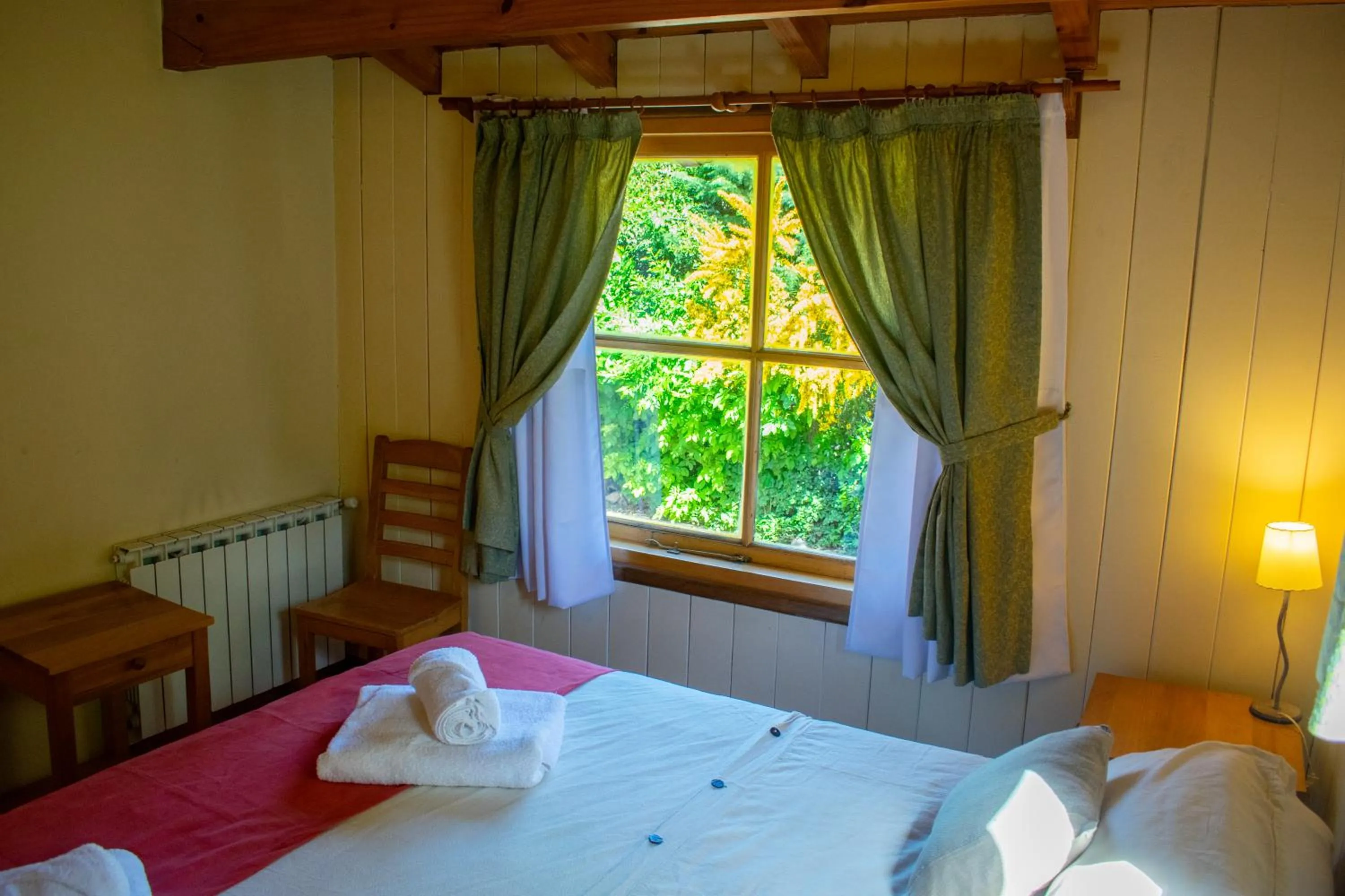 Bed in Hosteria y Cabañas Posada Quinen