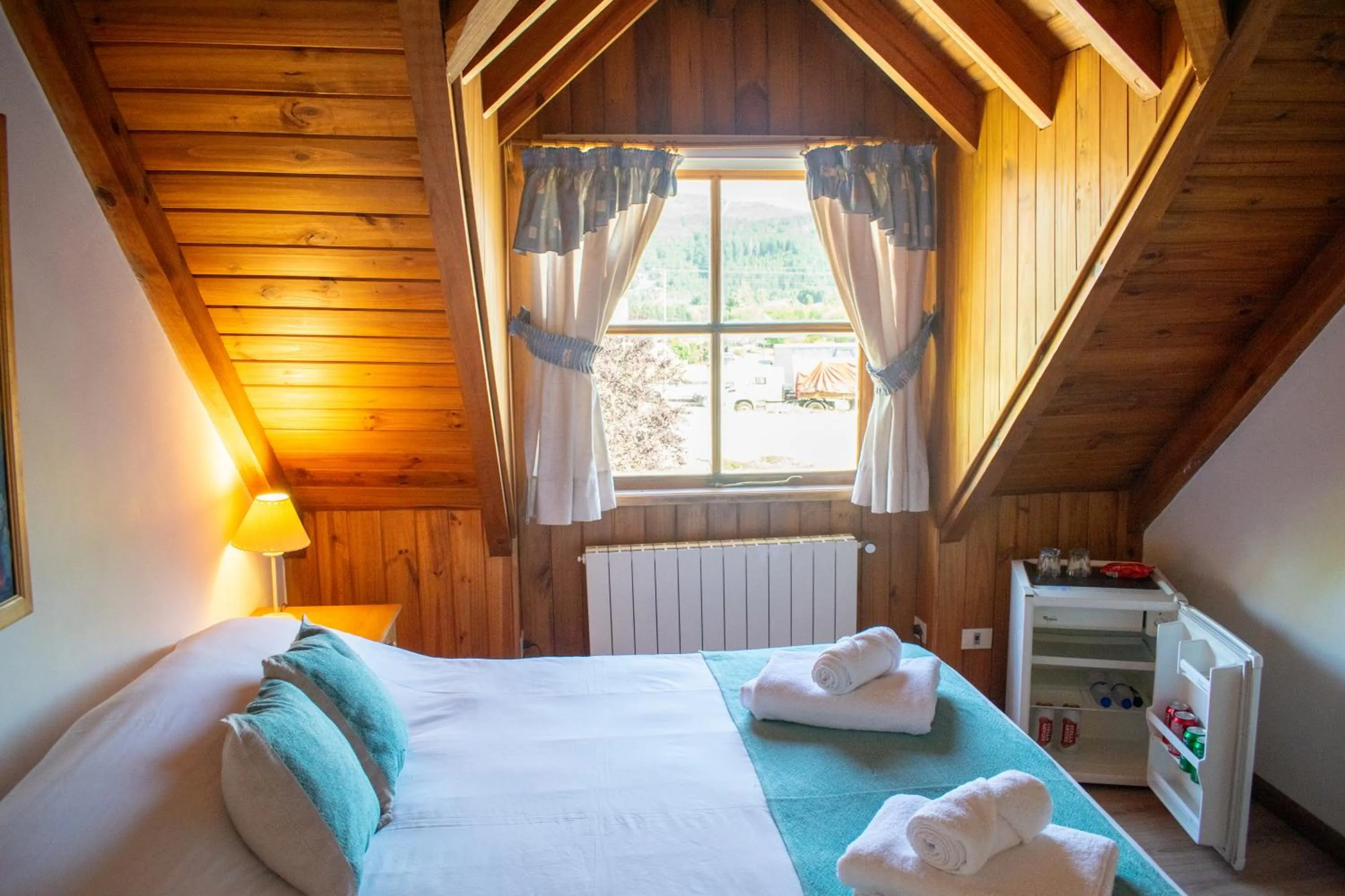 Bed in Hosteria y Cabañas Posada Quinen