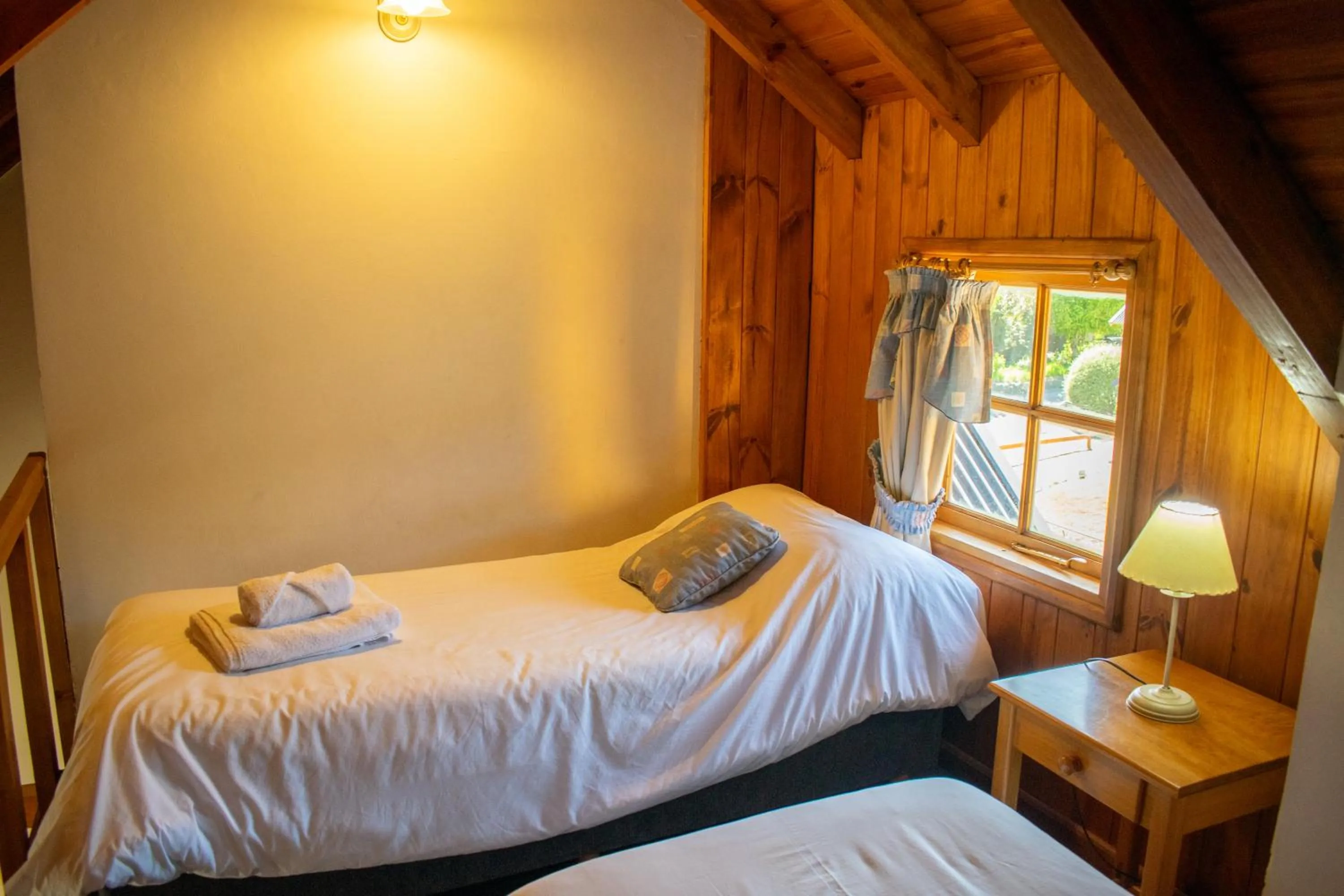 Bed in Hosteria y Cabañas Posada Quinen