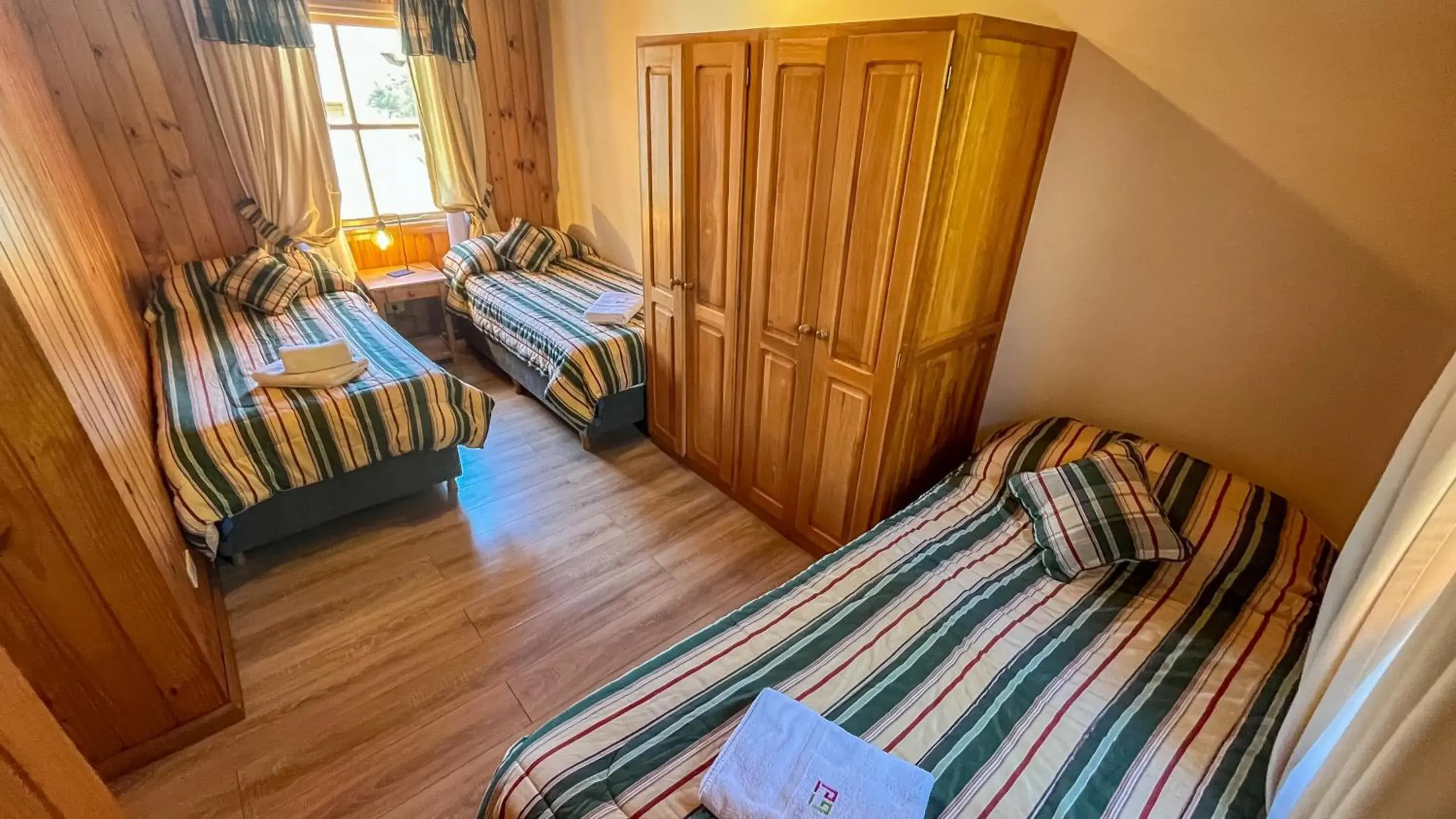 Bed in Hosteria y Cabañas Posada Quinen Bed in Hosteria y Cabañas Posada Quinen