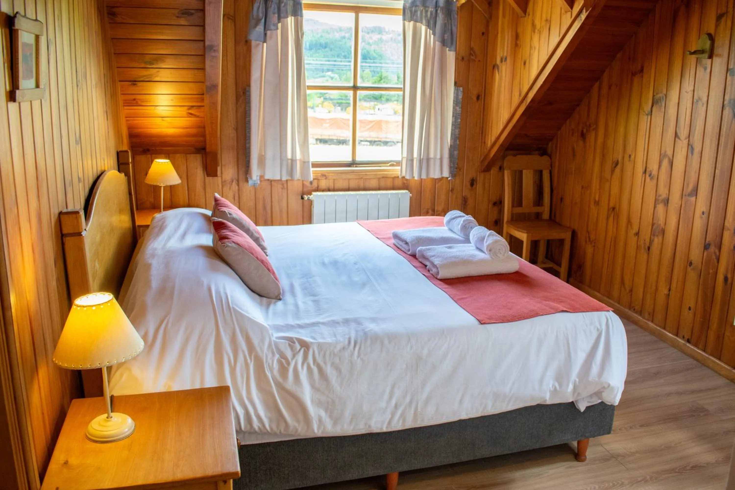 Bed in Hosteria y Cabañas Posada Quinen