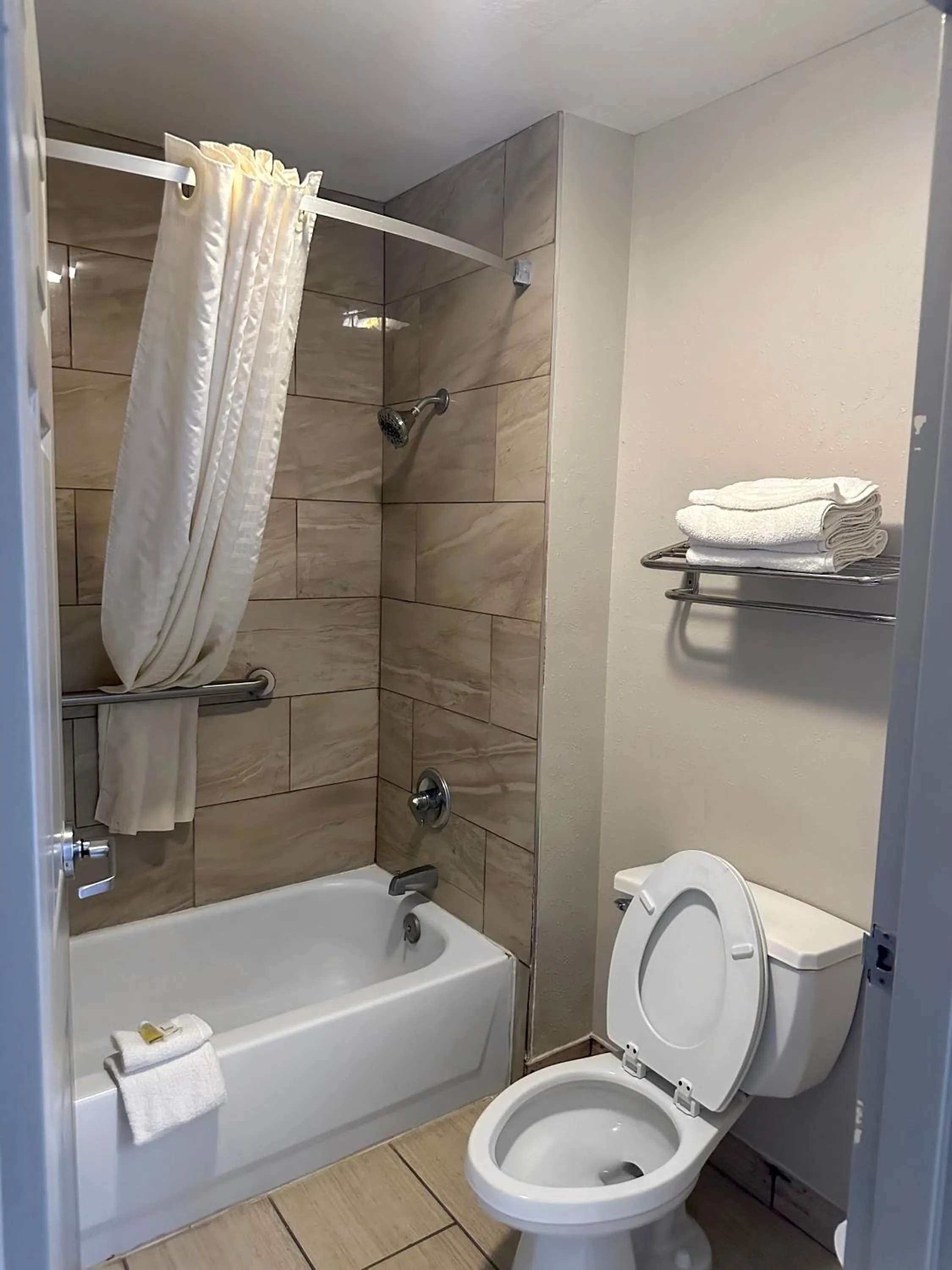 Bathroom in Days Inn & Suites by Wyndham Opelousas