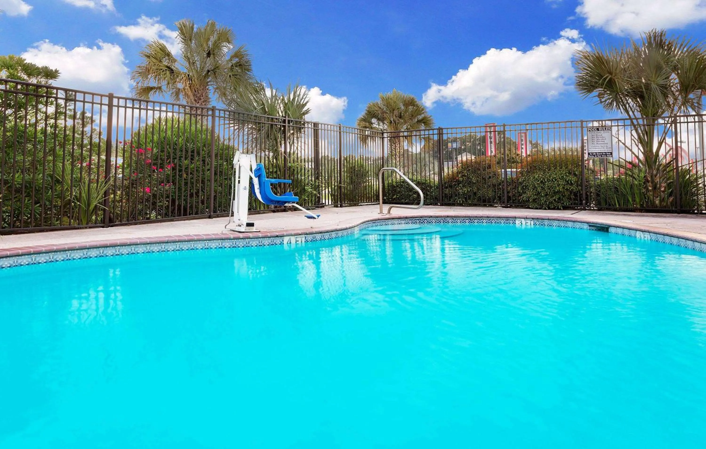 Pool view in Days Inn & Suites by Wyndham Opelousas