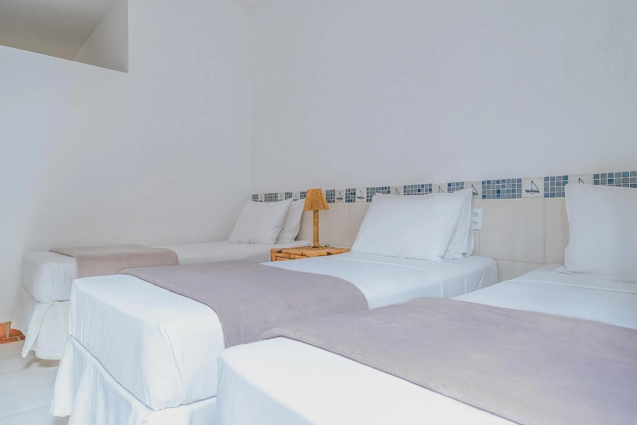 Bed in Pousada Porto Fino