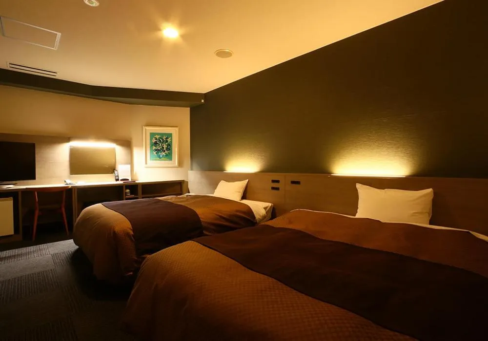 Bed in Hotel New Shizuoka