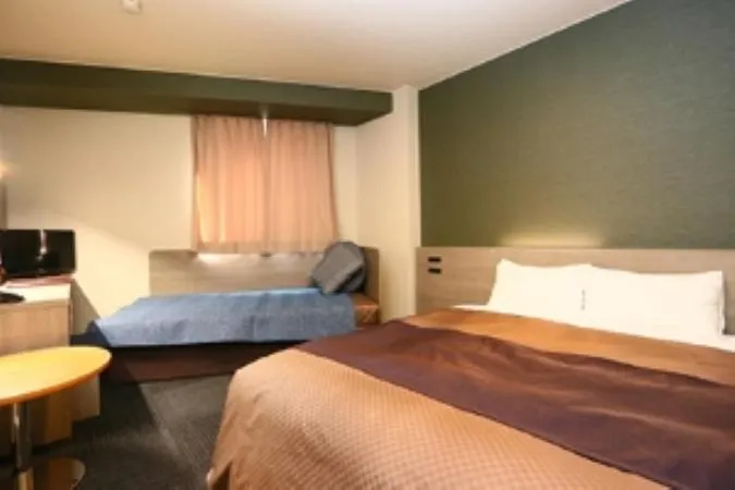 Bed in Hotel New Shizuoka