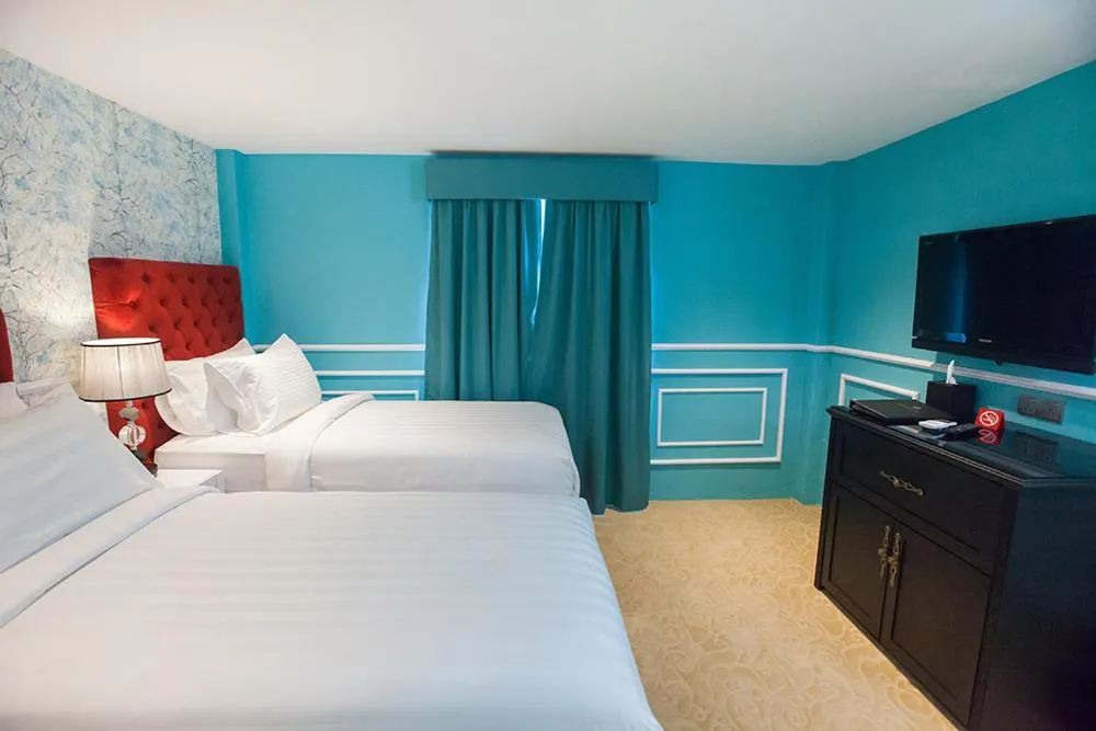 Photo of the whole room, Bed in Apple Heritage Hotel