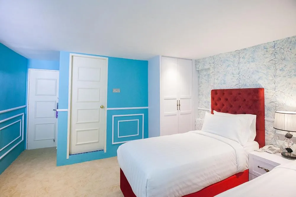 Bed in Apple Heritage Hotel