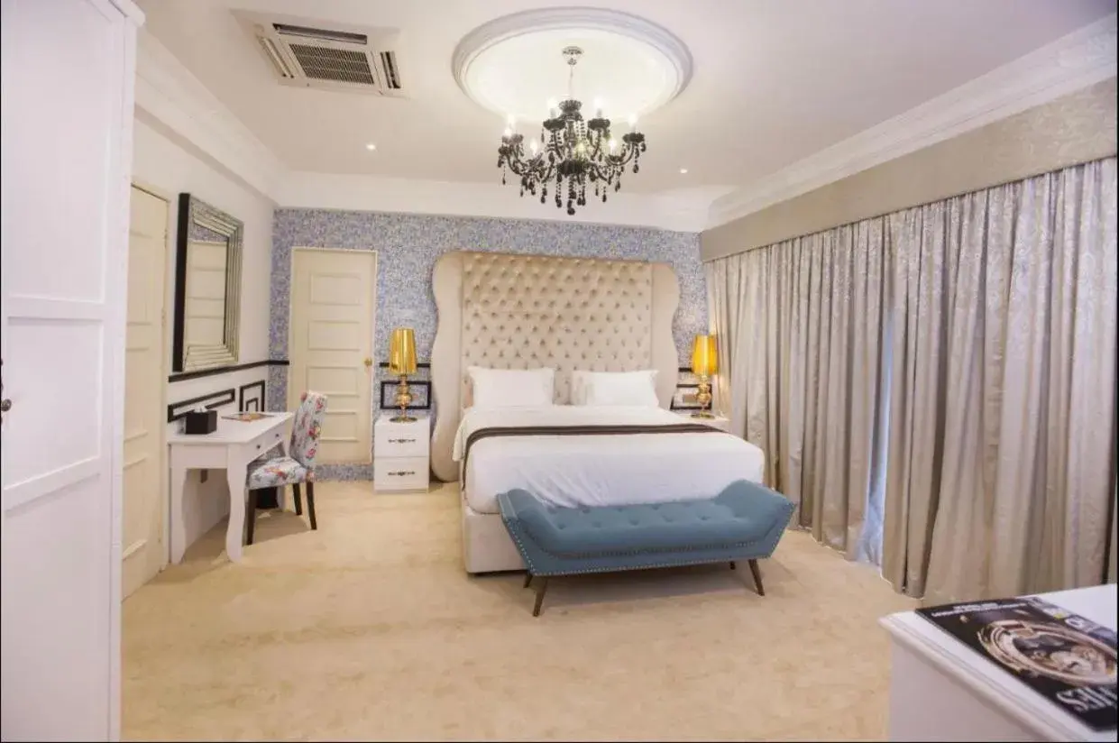 Bed in Apple Heritage Hotel Bed in Apple Heritage Hotel