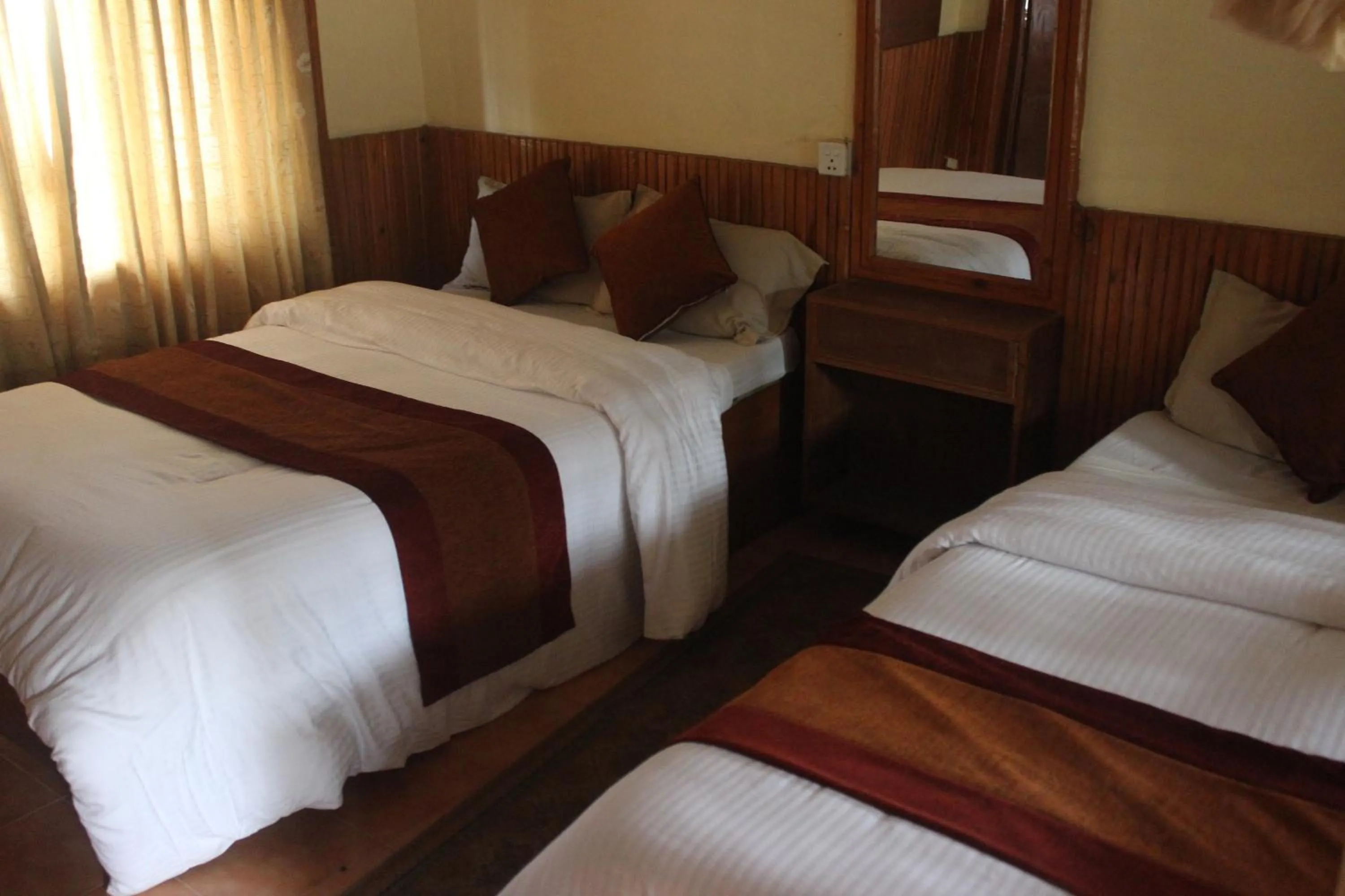 Bedroom, Bed in Chitwan Forest Resort with swimming pool , Chitwan National Park