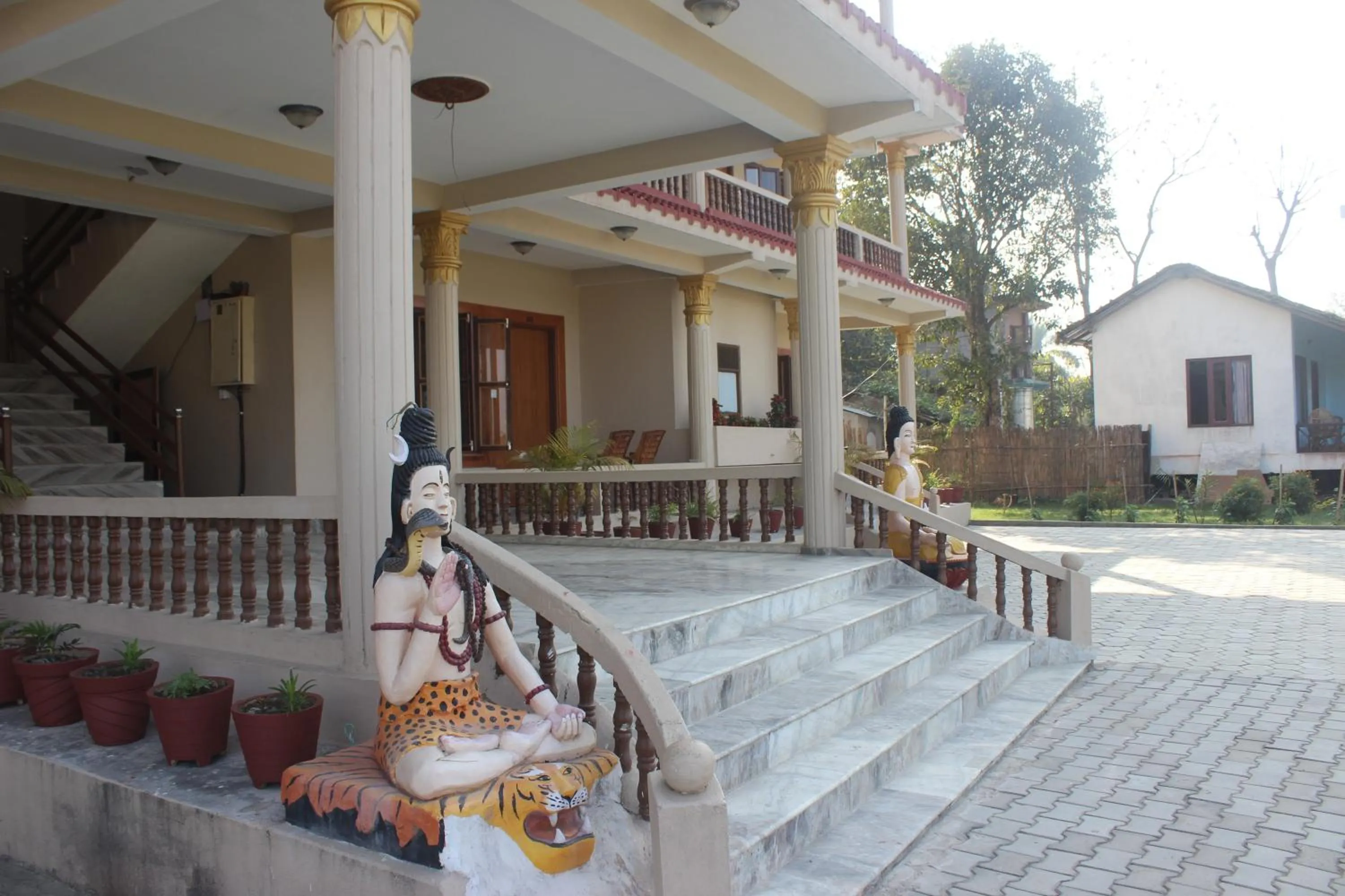 Property building in Chitwan Forest Resort with swimming pool , Chitwan National Park