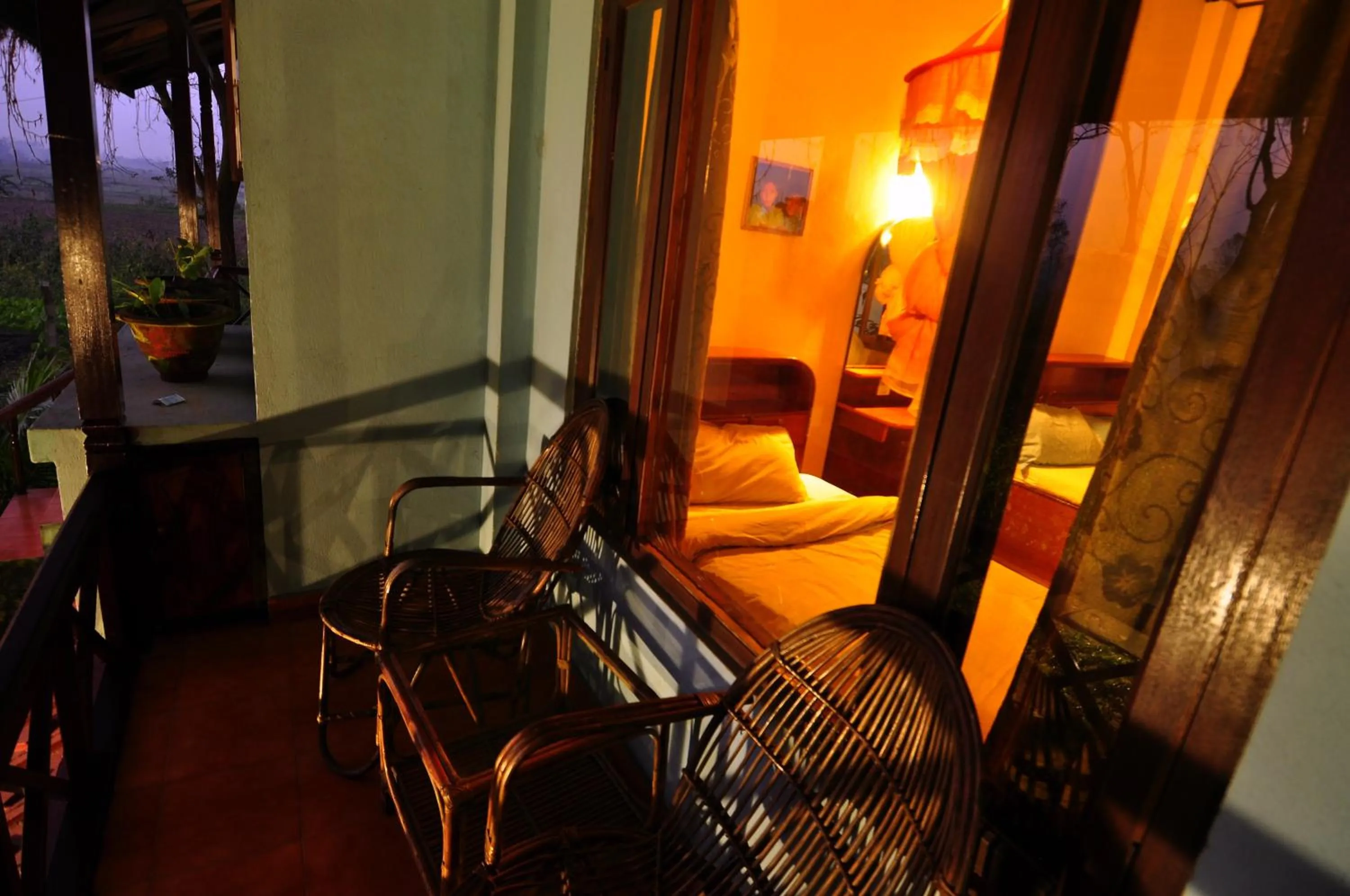 Bed in Chitwan Forest Resort with swimming pool , Chitwan National Park