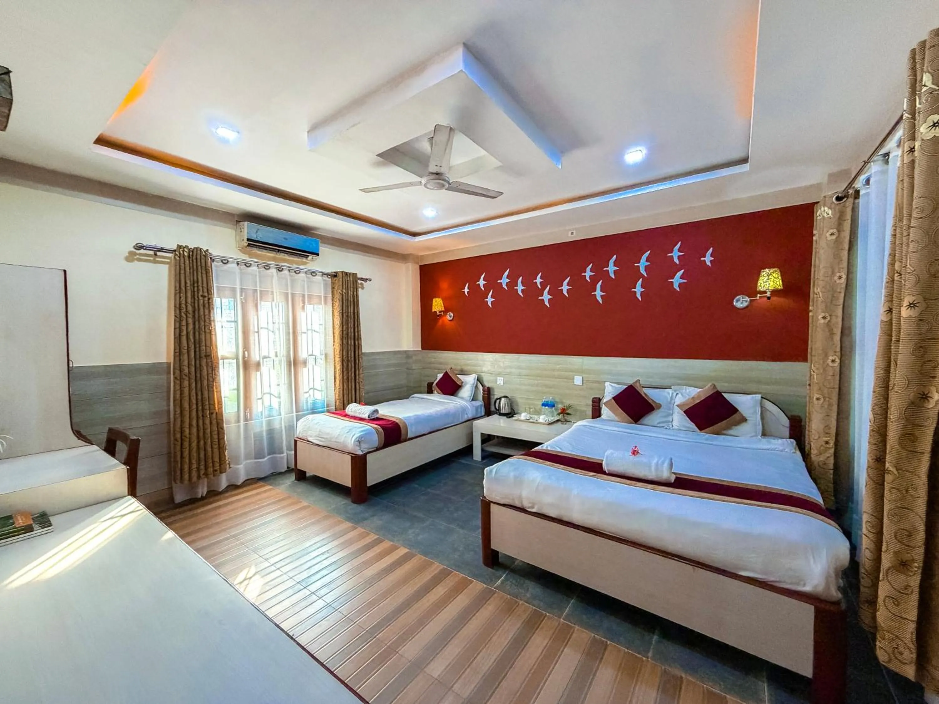Bedroom, Bed in Chitwan Forest Resort with swimming pool , Chitwan National Park