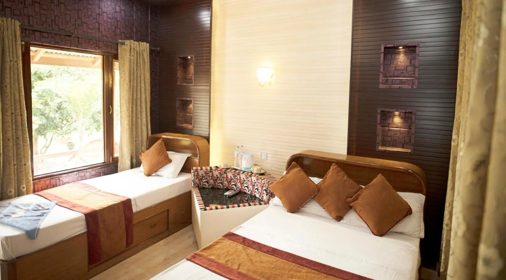 Bed in Chitwan Forest Resort with swimming pool , Chitwan National Park