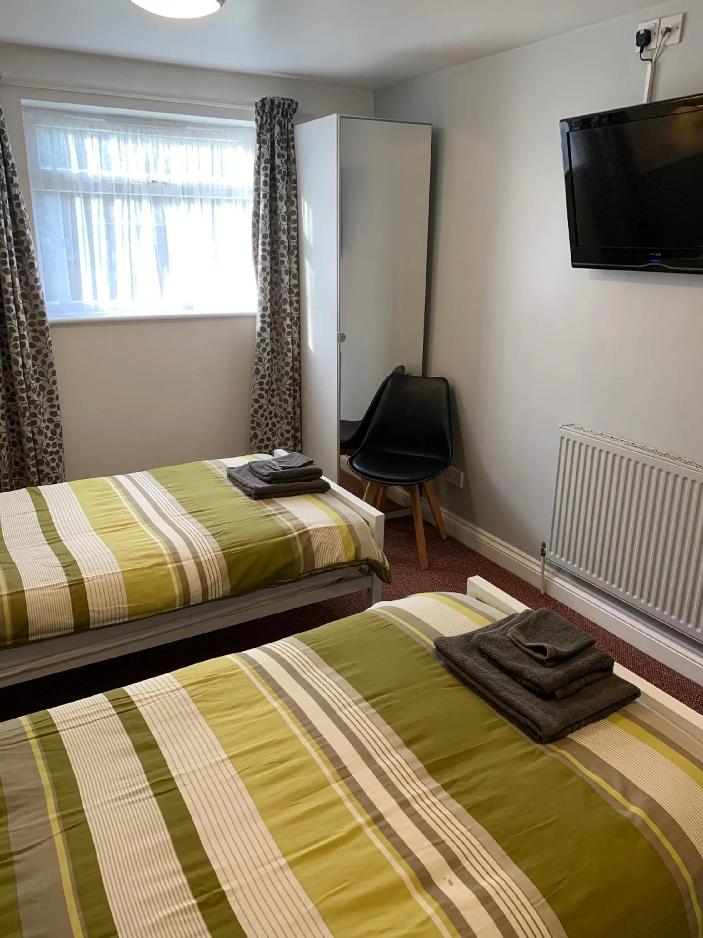 Photo of the whole room, Bed in Bedrock Lodge
