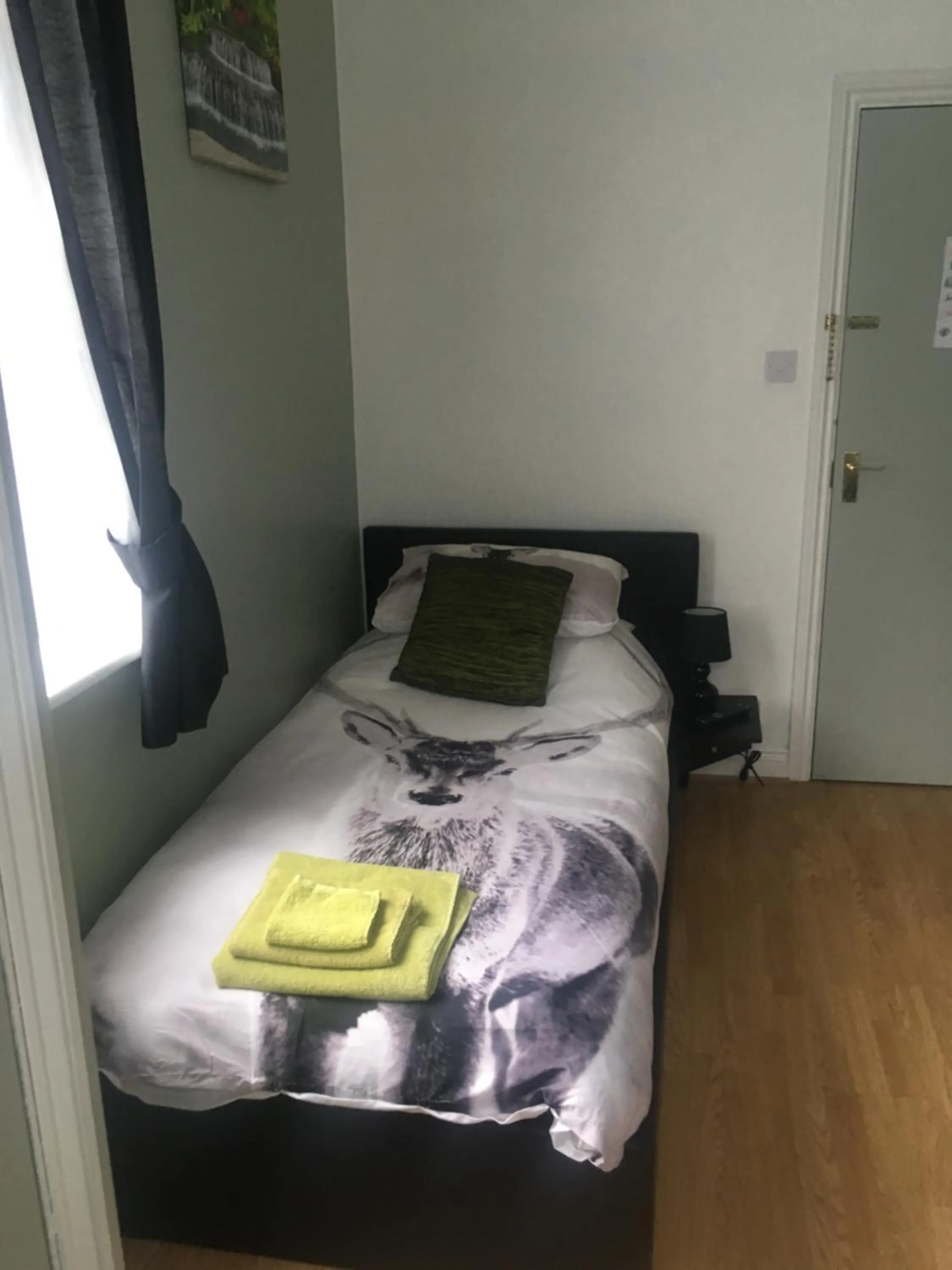 Photo of the whole room, Bed in Bedrock Lodge