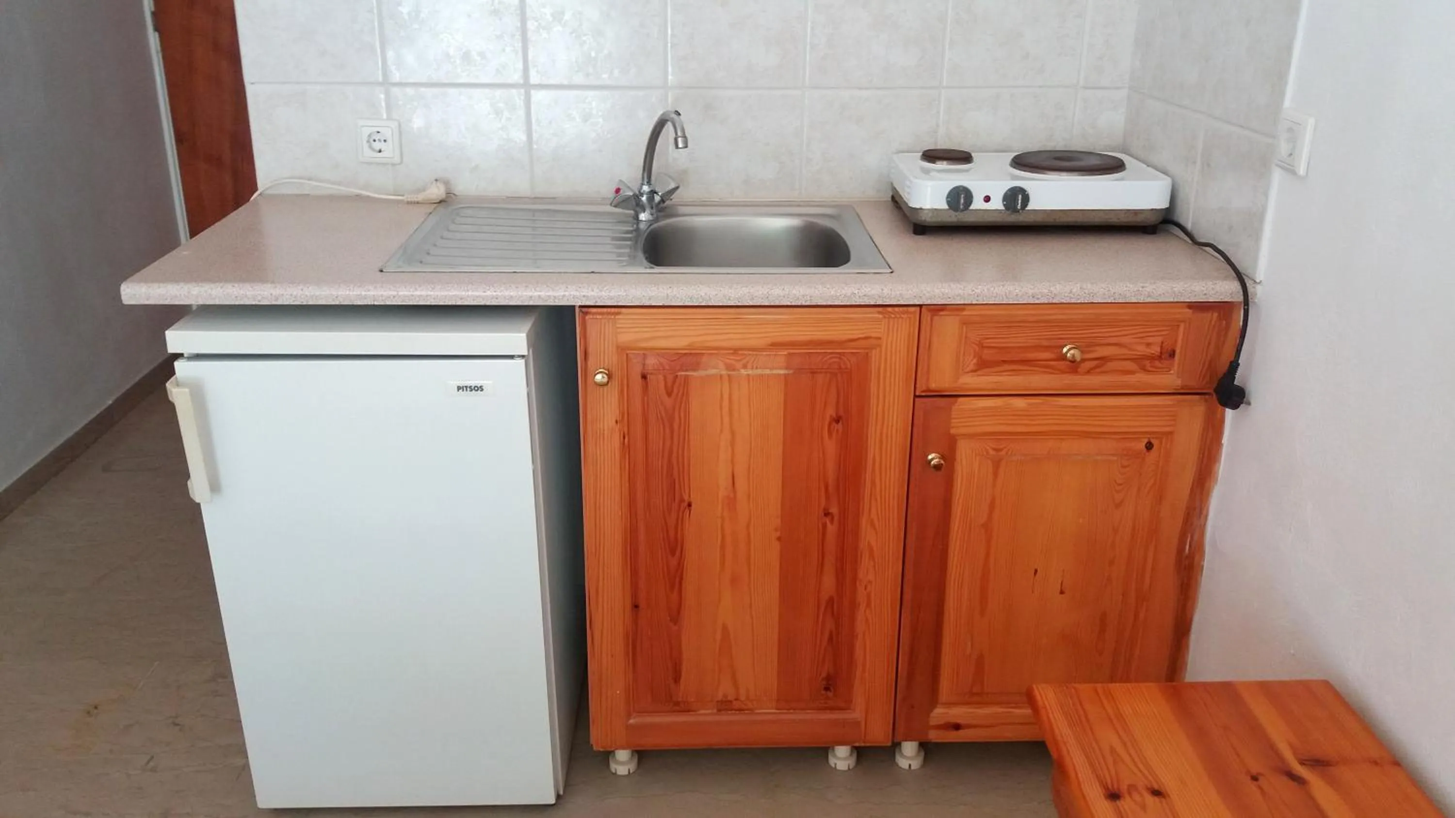 Kitchen or kitchenette in Kymata Hotel