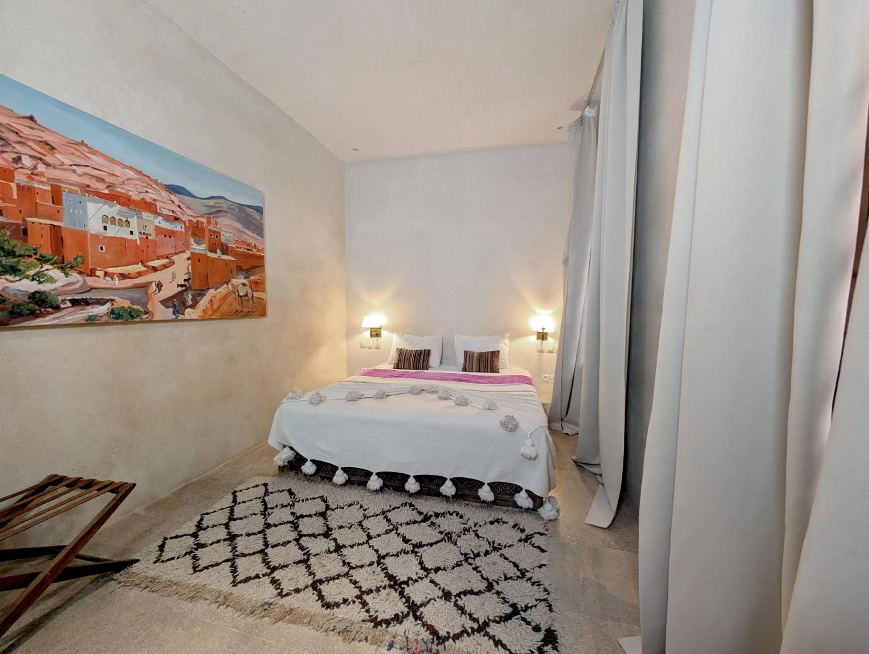 Bed in Riad Slitine & Spa