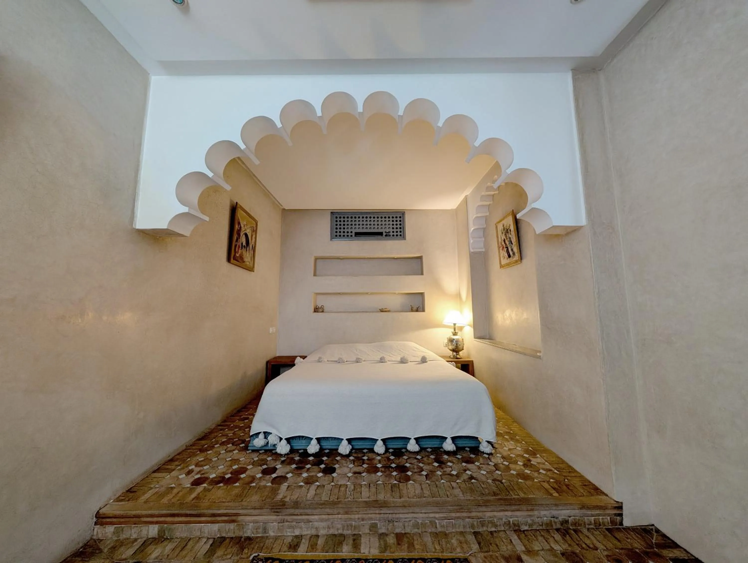 Bed in Riad Slitine & Spa