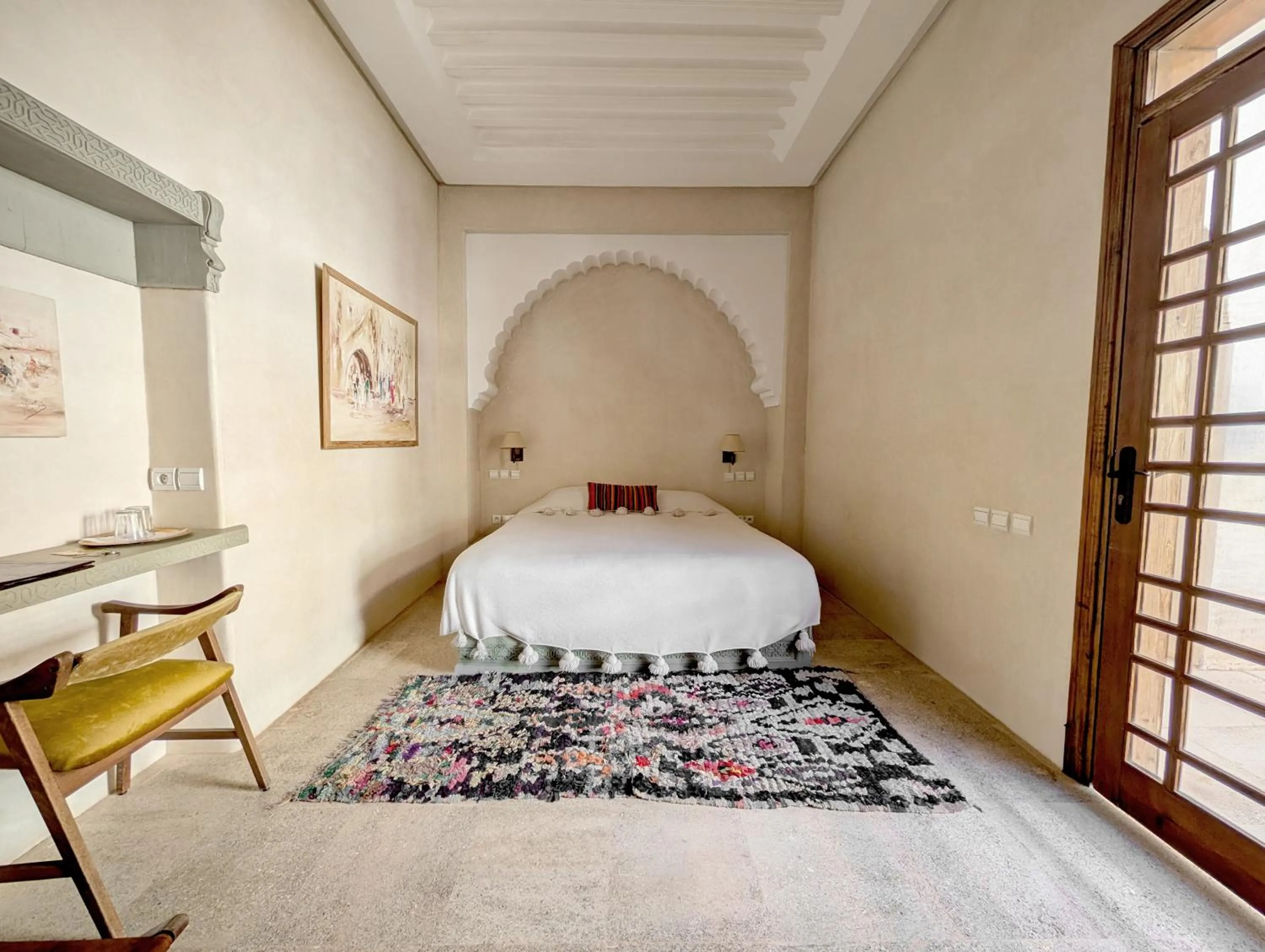 Bed in Riad Slitine & Spa