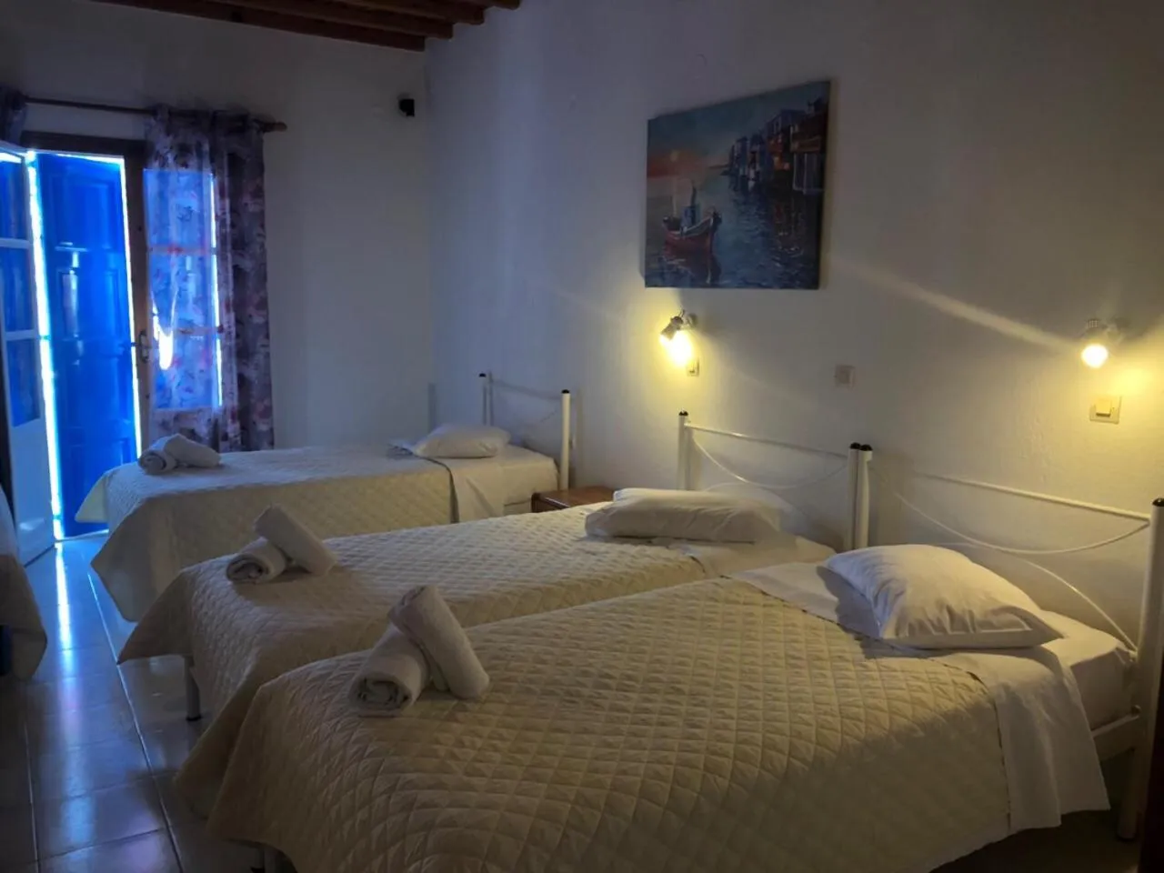 Bed in Anemos Hotel & Apartments
