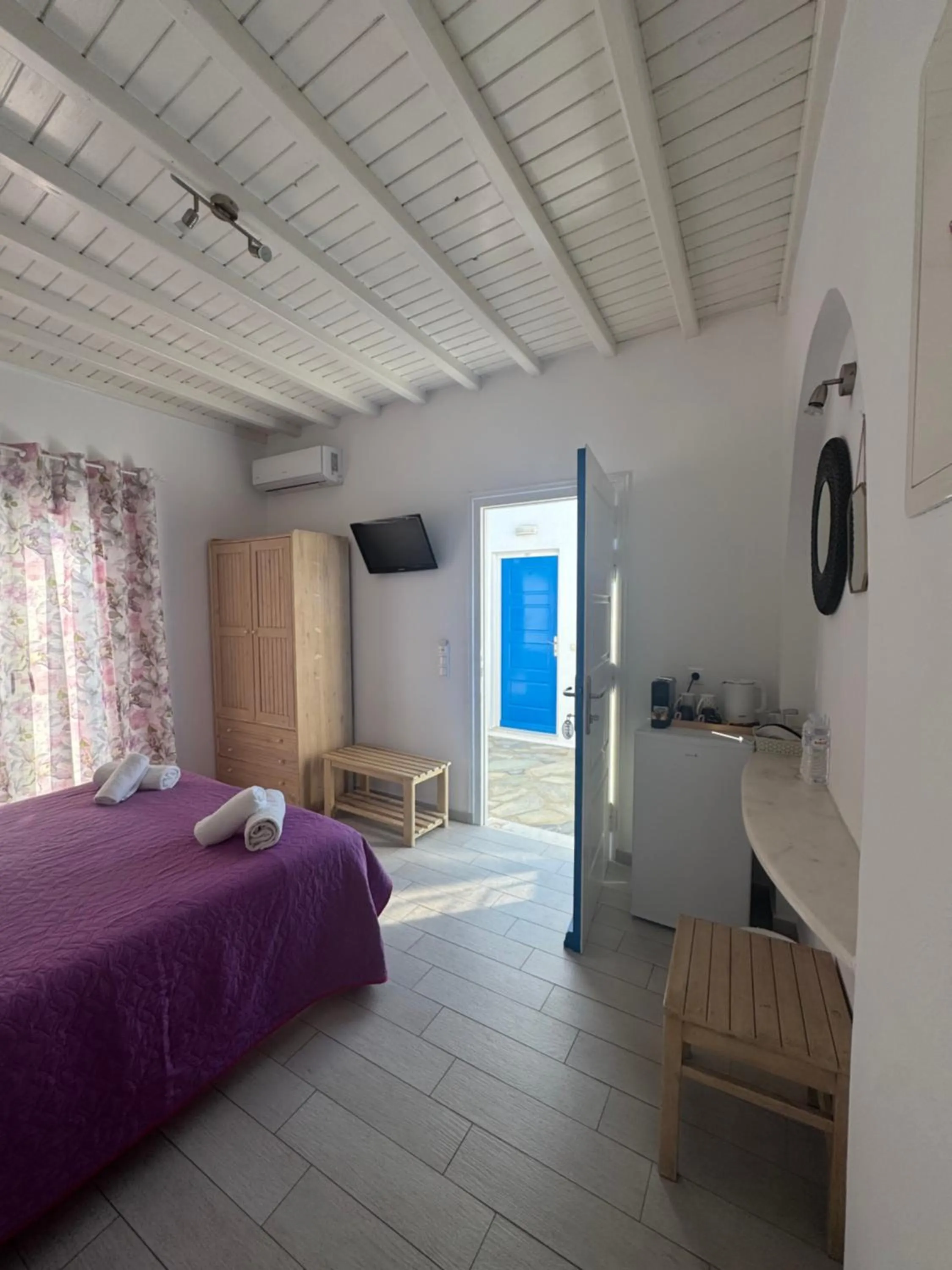 Bed in Anemos Hotel & Apartments