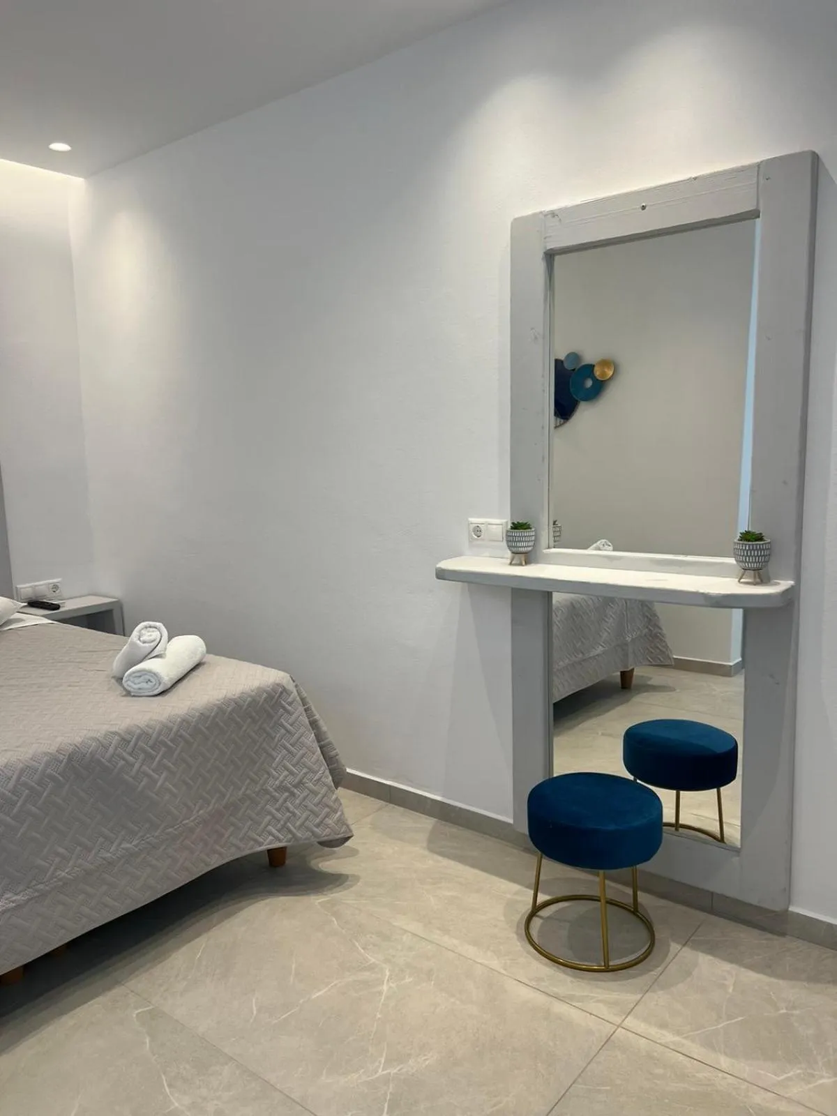 Bed in Anemos Hotel & Apartments