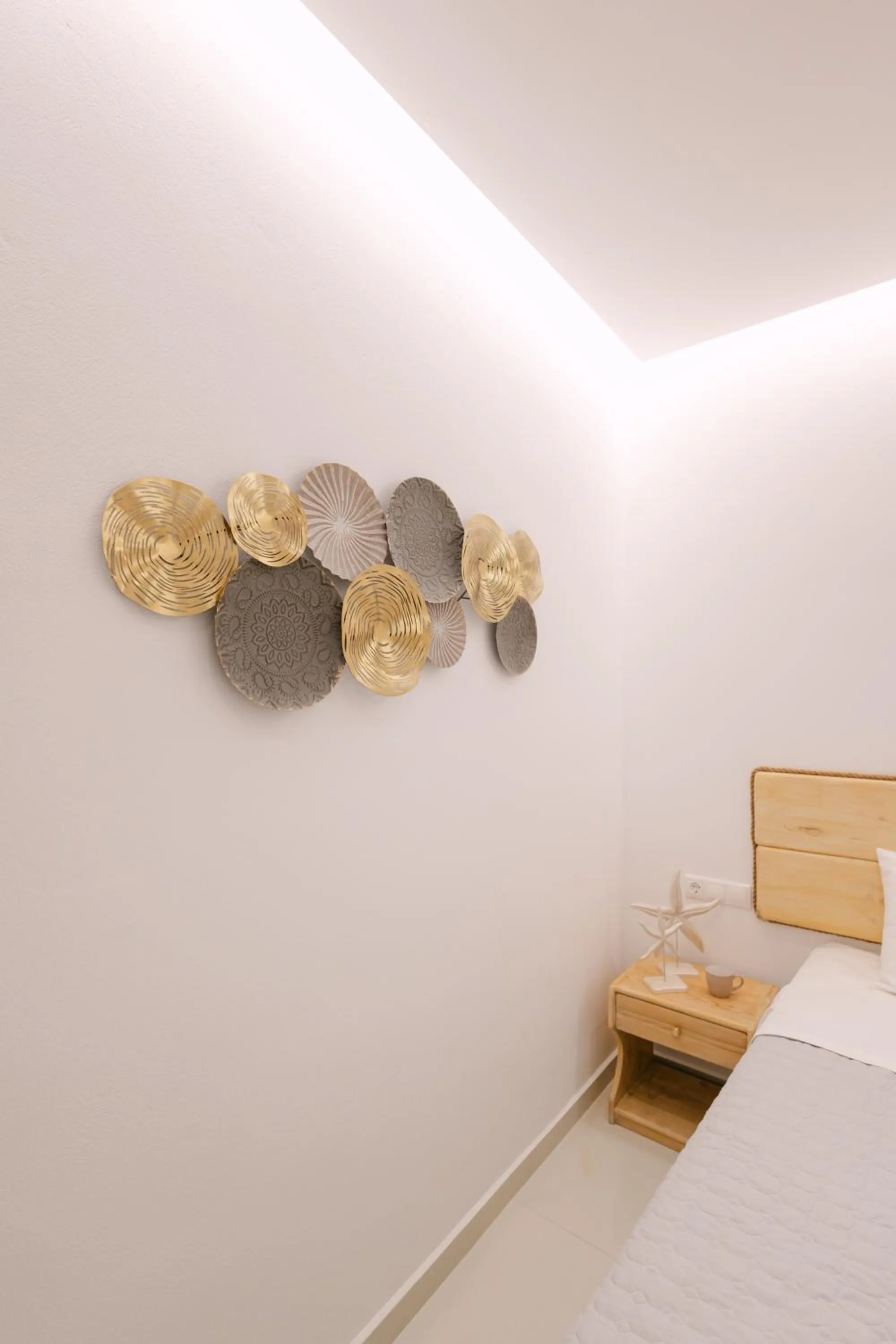 Bed in Anemos Hotel & Apartments