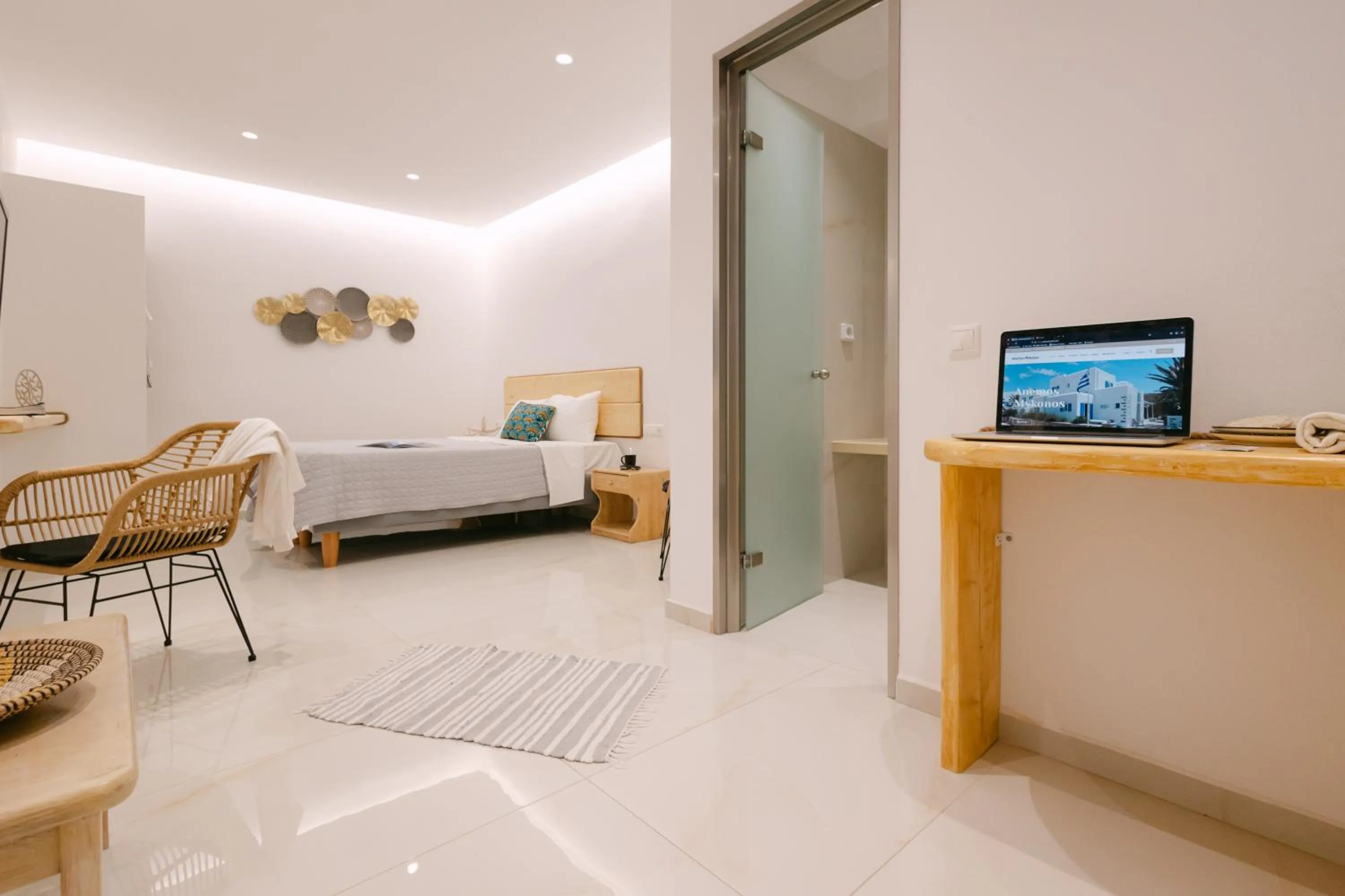 Bed in Anemos Hotel & Apartments