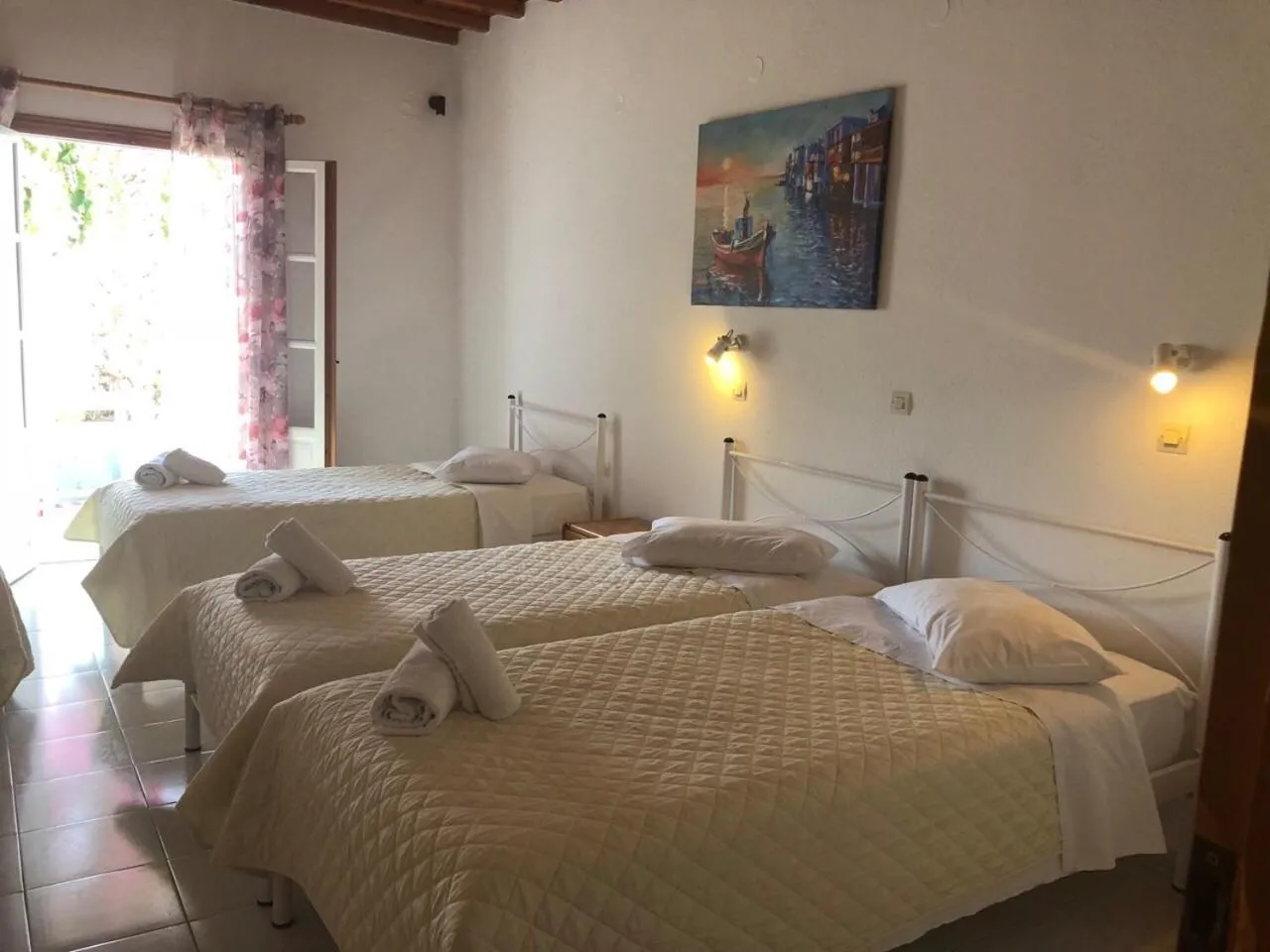 Bed in Anemos Hotel & Apartments