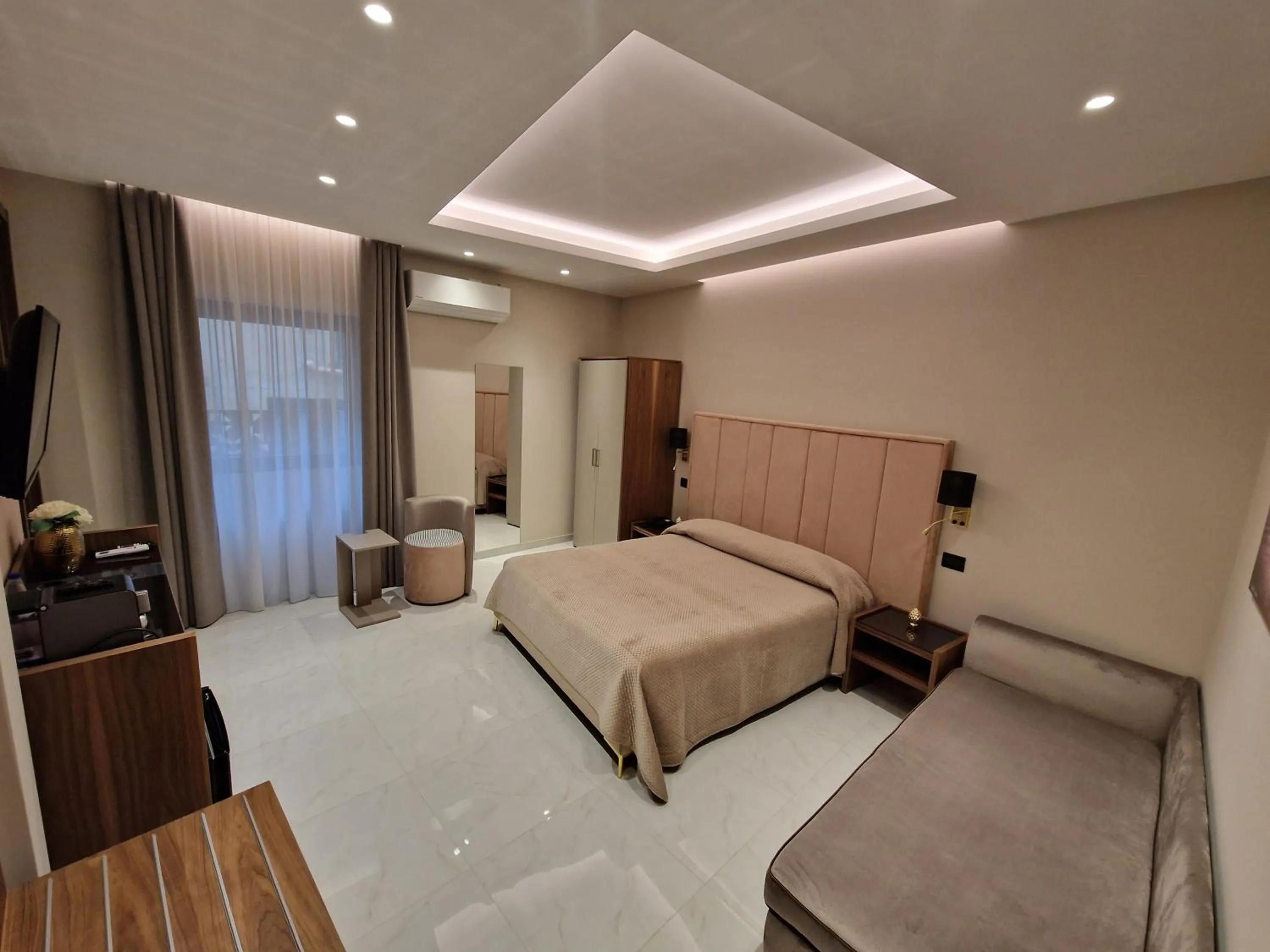 Bed in Beatus Suites And Rooms B&B