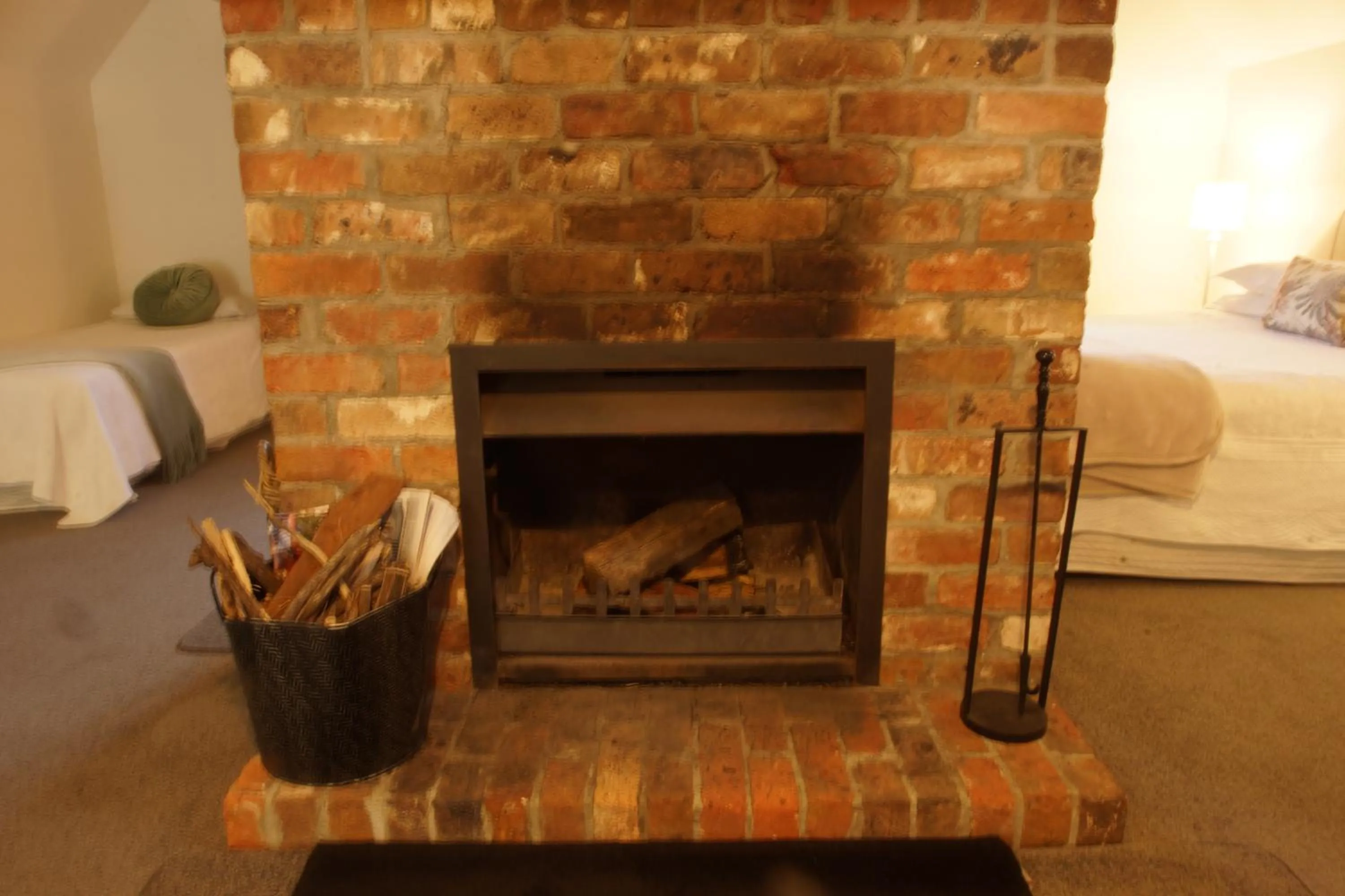 fireplace in The Carriages Boutique Hotel and Vineyard