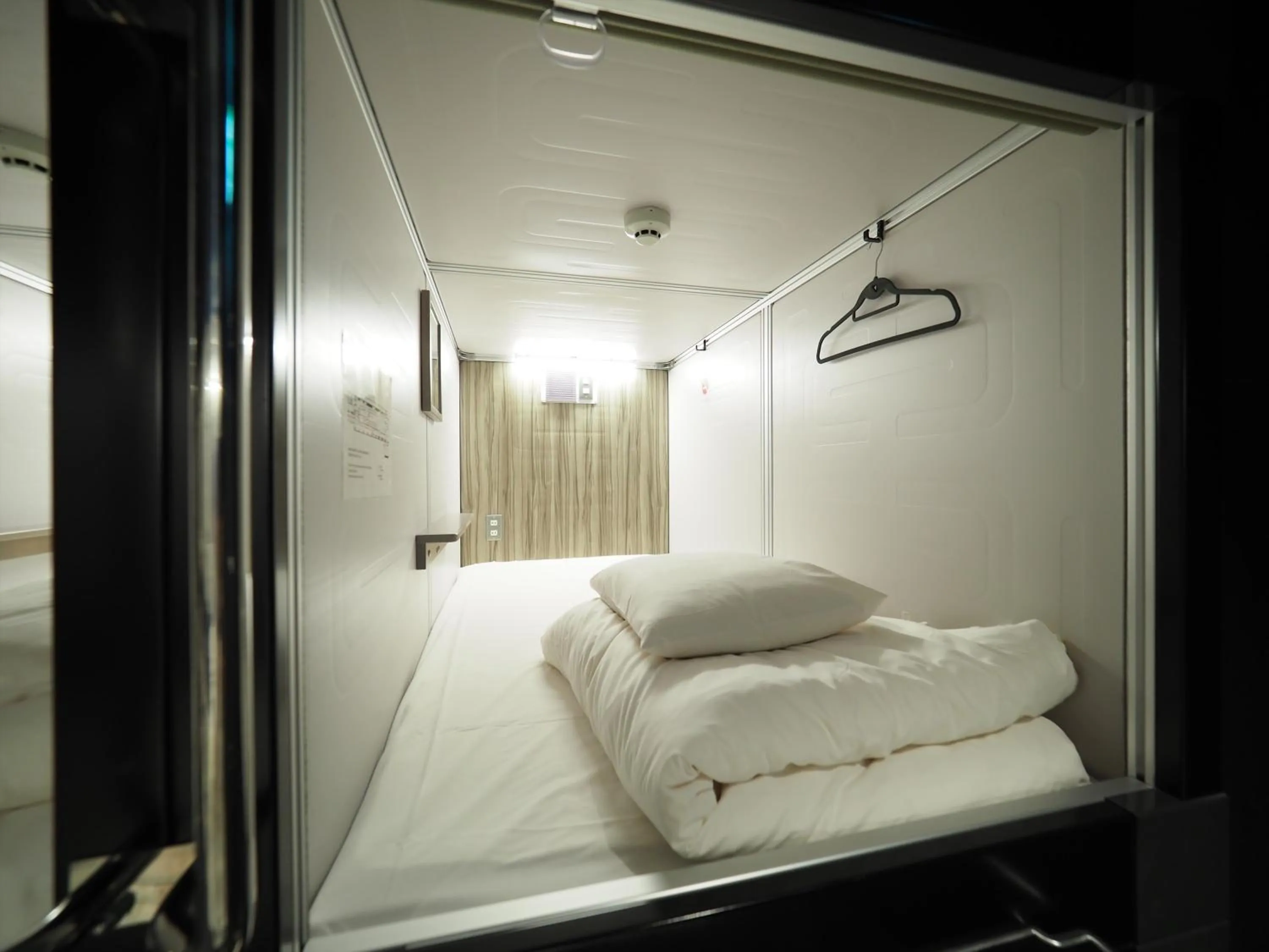 Photo of the whole room, Bed in LEO YU Capsule Hotel Nishifunabashi
