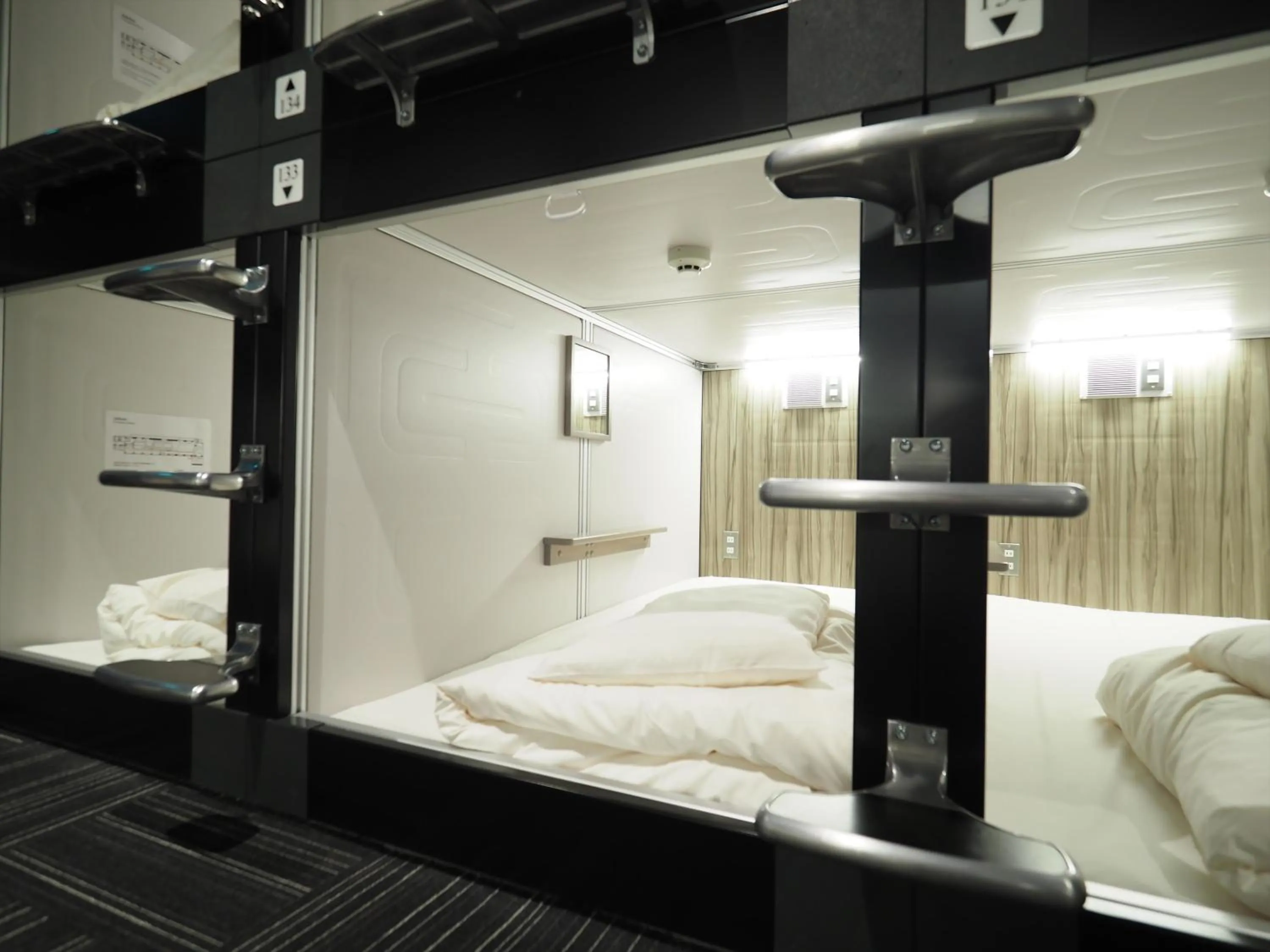 Photo of the whole room, Bed in LEO YU Capsule Hotel Nishifunabashi