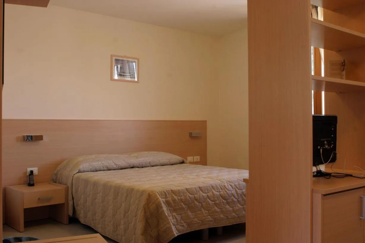 Bed in Hotel Ristorante Cigno - Camere and Aparthotel