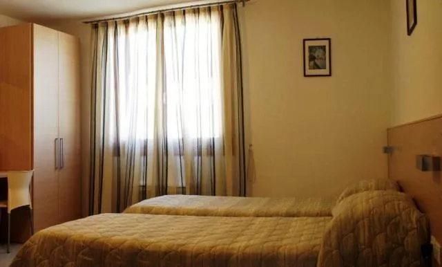 Bed in Hotel Ristorante Cigno - Camere and Aparthotel