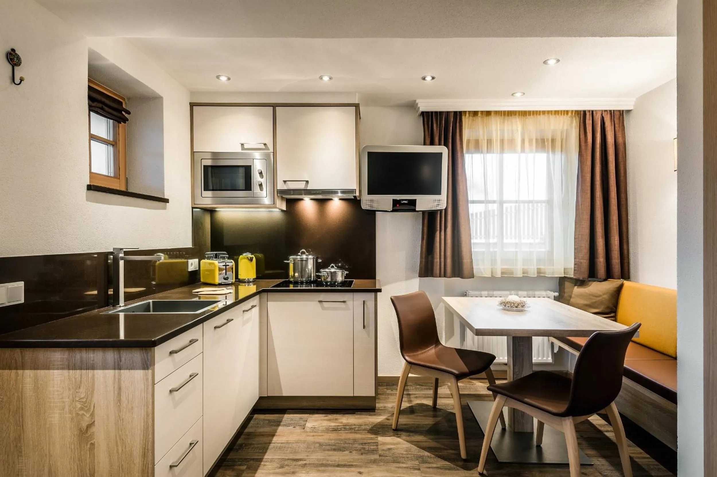 Kitchen or kitchenette in Taela Apartments