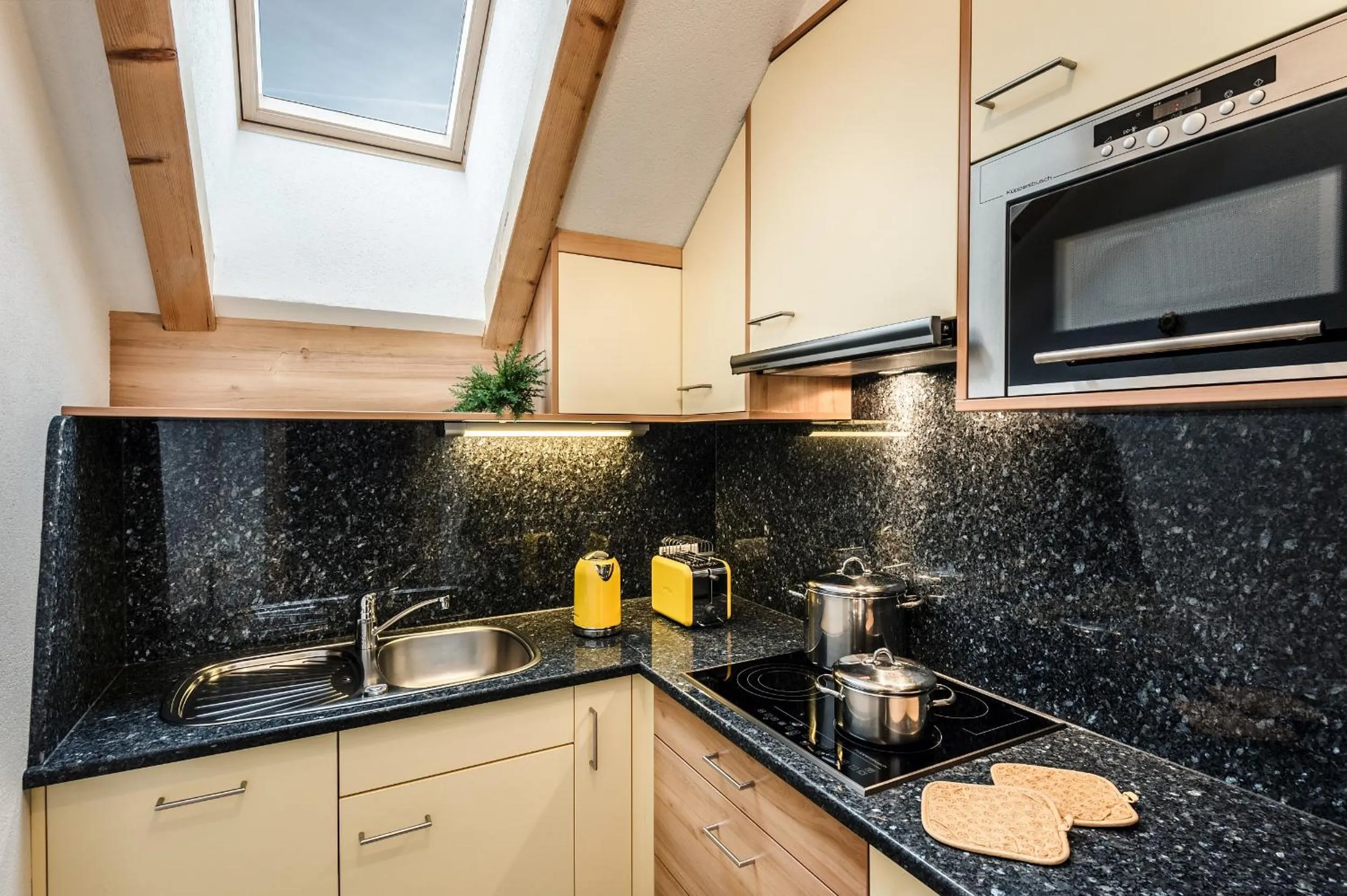 Kitchen or kitchenette in Taela Apartments