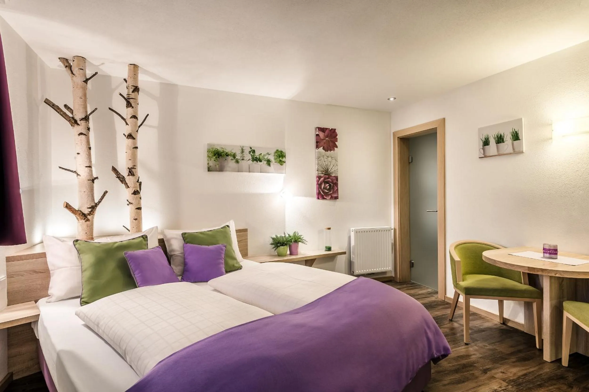 Living room, Bed in Taela Apartments