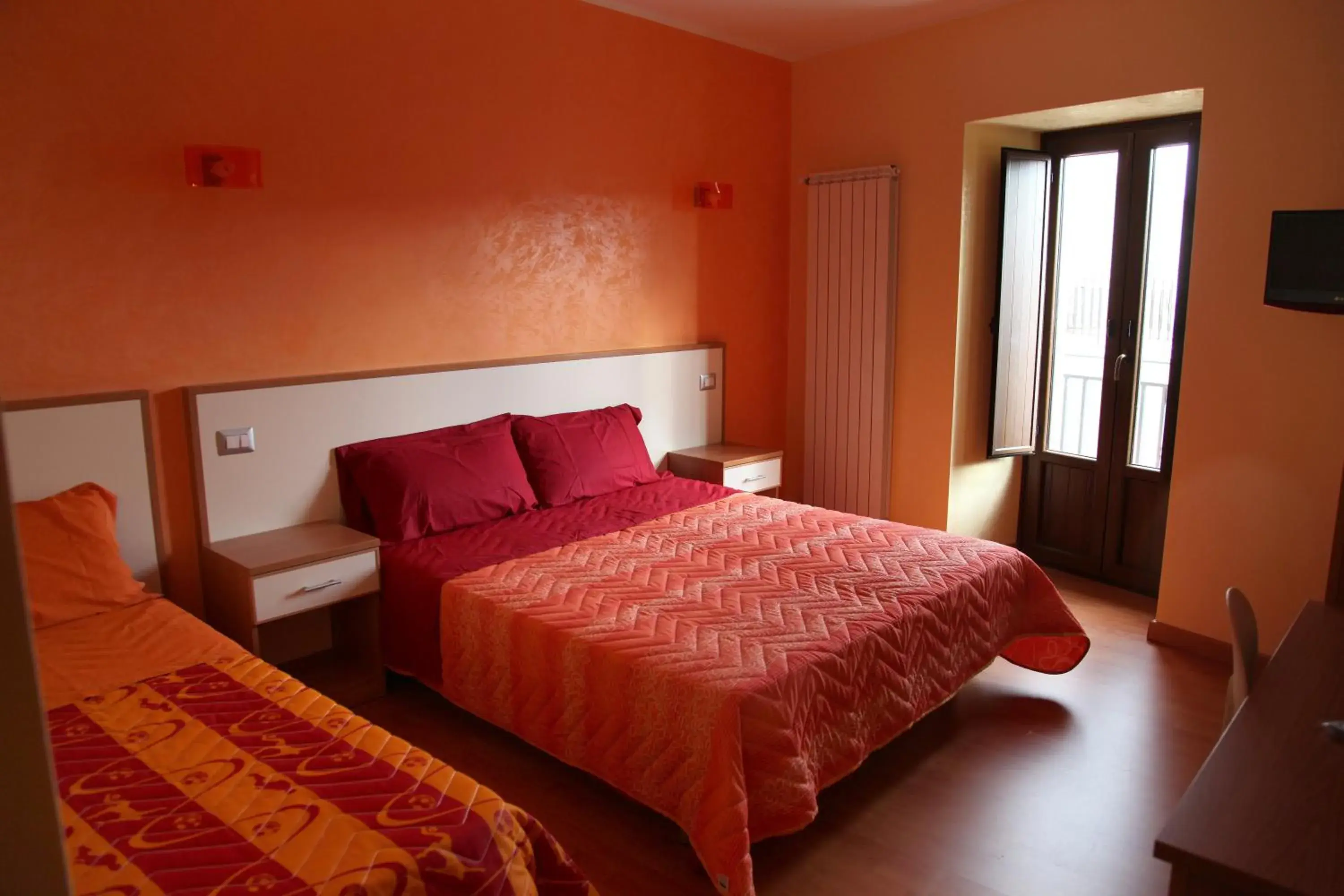 Triple Room in B&B DEL CORSO Triple Room in B&B DEL CORSO