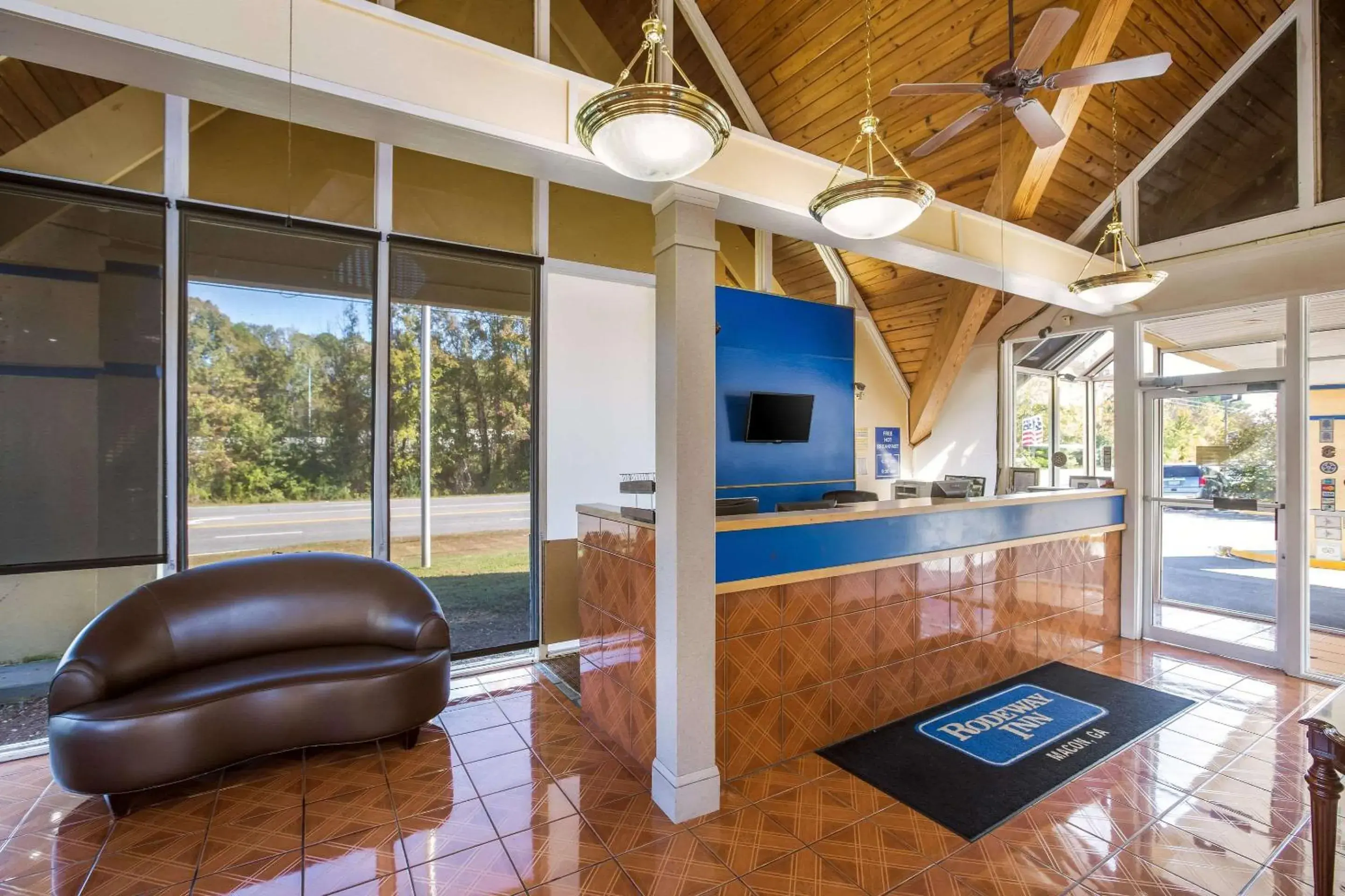 Lobby or reception in Super 8 by Wyndham Macon GA Lobby or reception in Super 8 by Wyndham Macon GA